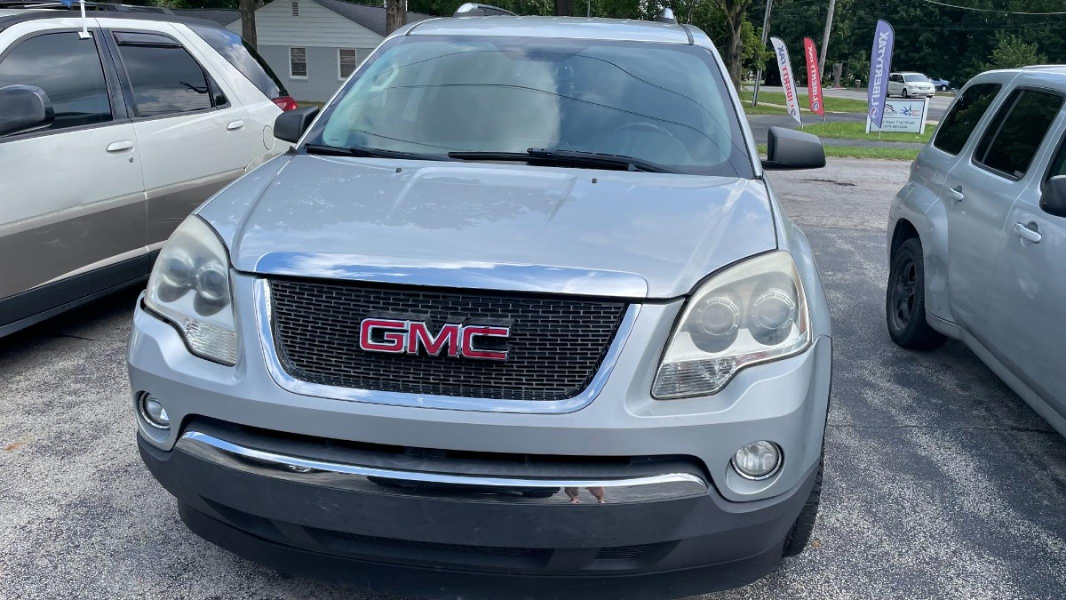 2009 Silver GMC Acadia SLE-1 AWD (1GKEV13D09J) with an 3.6L V6 DOHC 24V engine, 6-Speed Automatic transmission, located at 2710A Westlane Rd., Indianapolis, IN, 46268, (317) 291-2000, 39.885670, -86.208160 - Photo #0