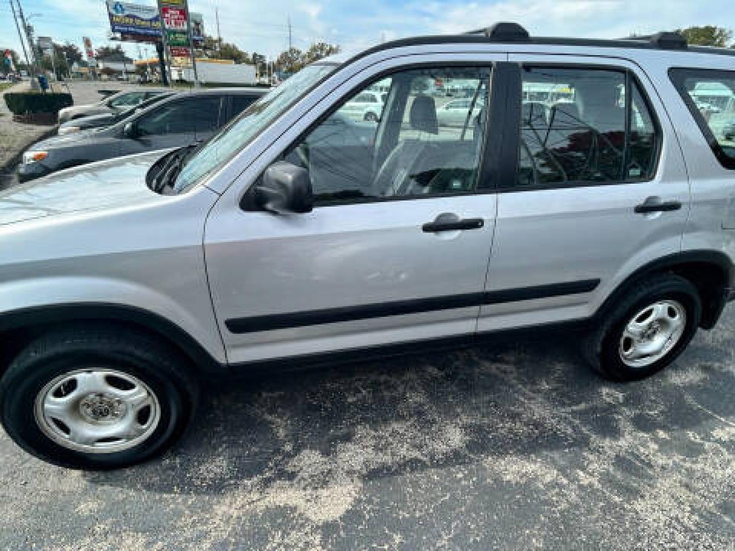 2003 Silver /GRAY Honda CR-V LX 4WD 4-spd AT (JHLRD78423C) with an 2.4L L4 DOHC 16V engine, 4-Speed Automatic Overdrive transmission, located at 2710A Westlane Rd., Indianapolis, IN, 46268, (317) 291-2000, 39.885670, -86.208160 - Photo#2