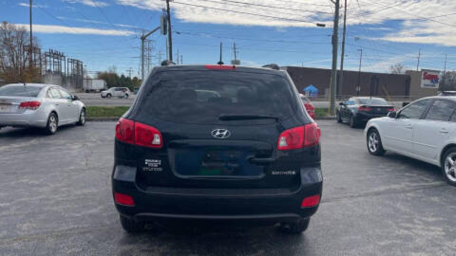 2008 BLUE /GRAY Hyundai Santa Fe GLS (5NMSG13D58H) with an 2.7L V6 DOHC 24V engine, 4-Speed Automatic transmission, located at 2710A Westlane Rd., Indianapolis, IN, 46268, (317) 291-2000, 39.885670, -86.208160 - Photo#3