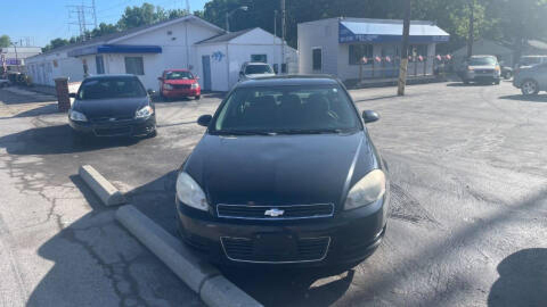 2007 BLACK /GRAY Chevrolet Impala LS (2G1WB58K279) with an 3.5L V6 OHV 16V FFV engine, 4-Speed Automatic Overdrive transmission, located at 2710A Westlane Rd., Indianapolis, IN, 46268, (317) 291-2000, 39.885670, -86.208160 - Photo#1