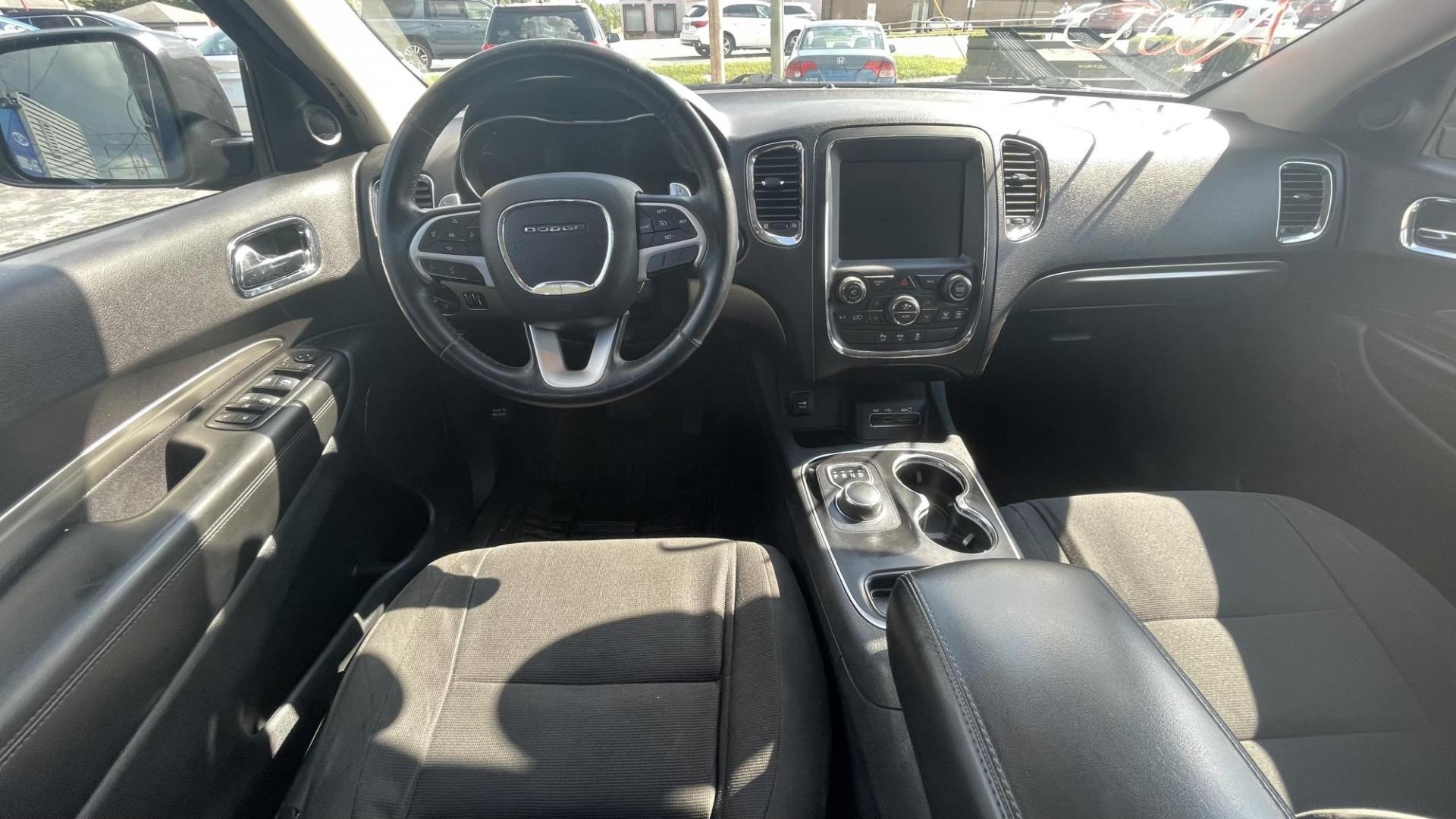 2014 Dodge Durango SXT (1C4RDJAG7EC) with an 3.6L V6 DOHC 24V engine, 8 SPEED AUTOMATIC transmission, located at 2710A Westlane Rd., Indianapolis, IN, 46268, (317) 291-2000, 39.885670, -86.208160 - ALL WHEEL DRIVE 7 PASSENGER SEATING REAR TEMPERATURE CONTROLS PUSH START TOUCH SCREEN RADIO - Photo#9