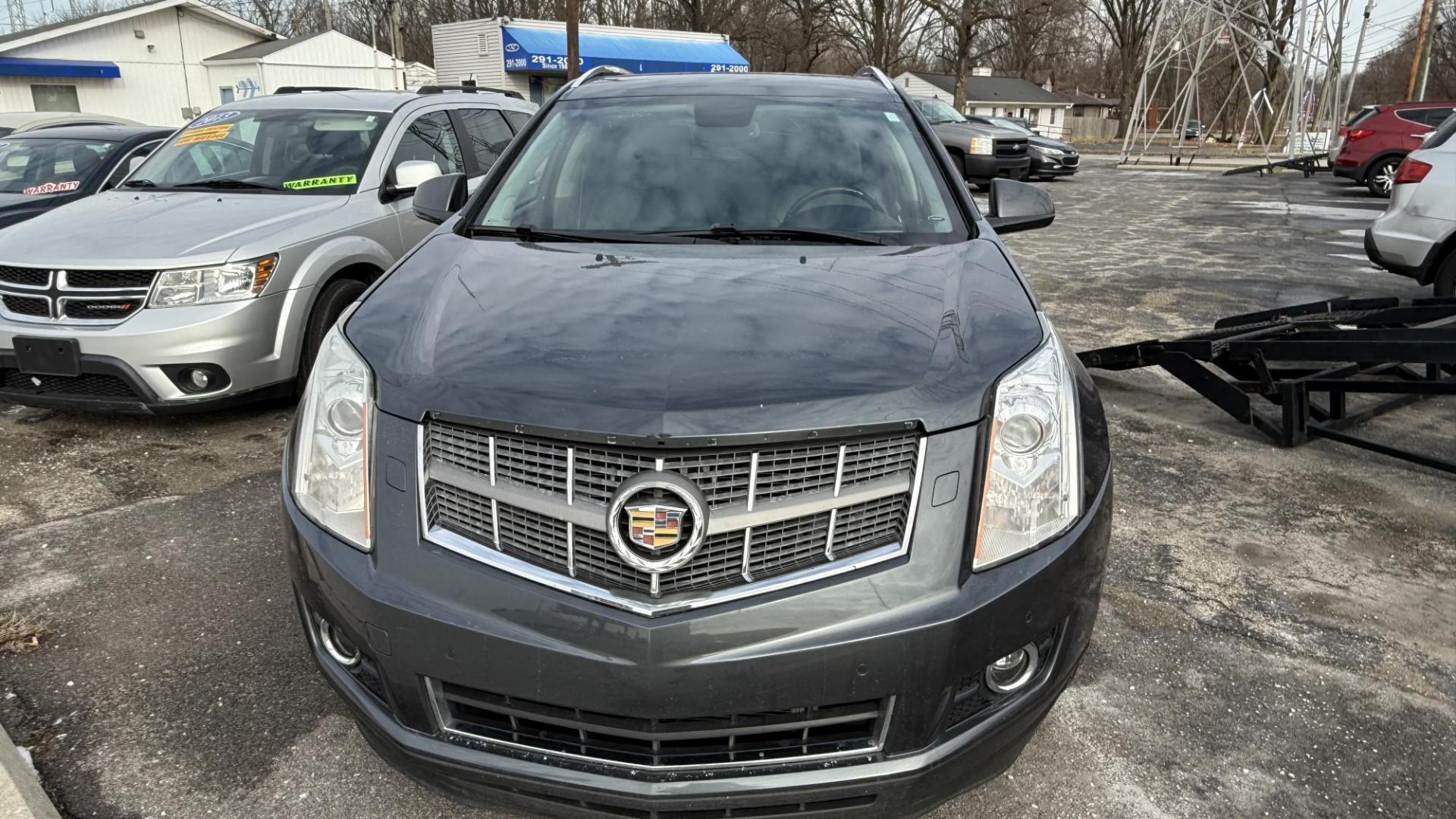 2011 BLUE Cadillac SRX Performance Collection AWD (3GYFNEEY5BS) with an 3.0L V6 DOHC 24V engine, 6-Speed Automatic transmission, located at 2710A Westlane Rd., Indianapolis, IN, 46268, (317) 291-2000, 39.885670, -86.208160 - Photo#2