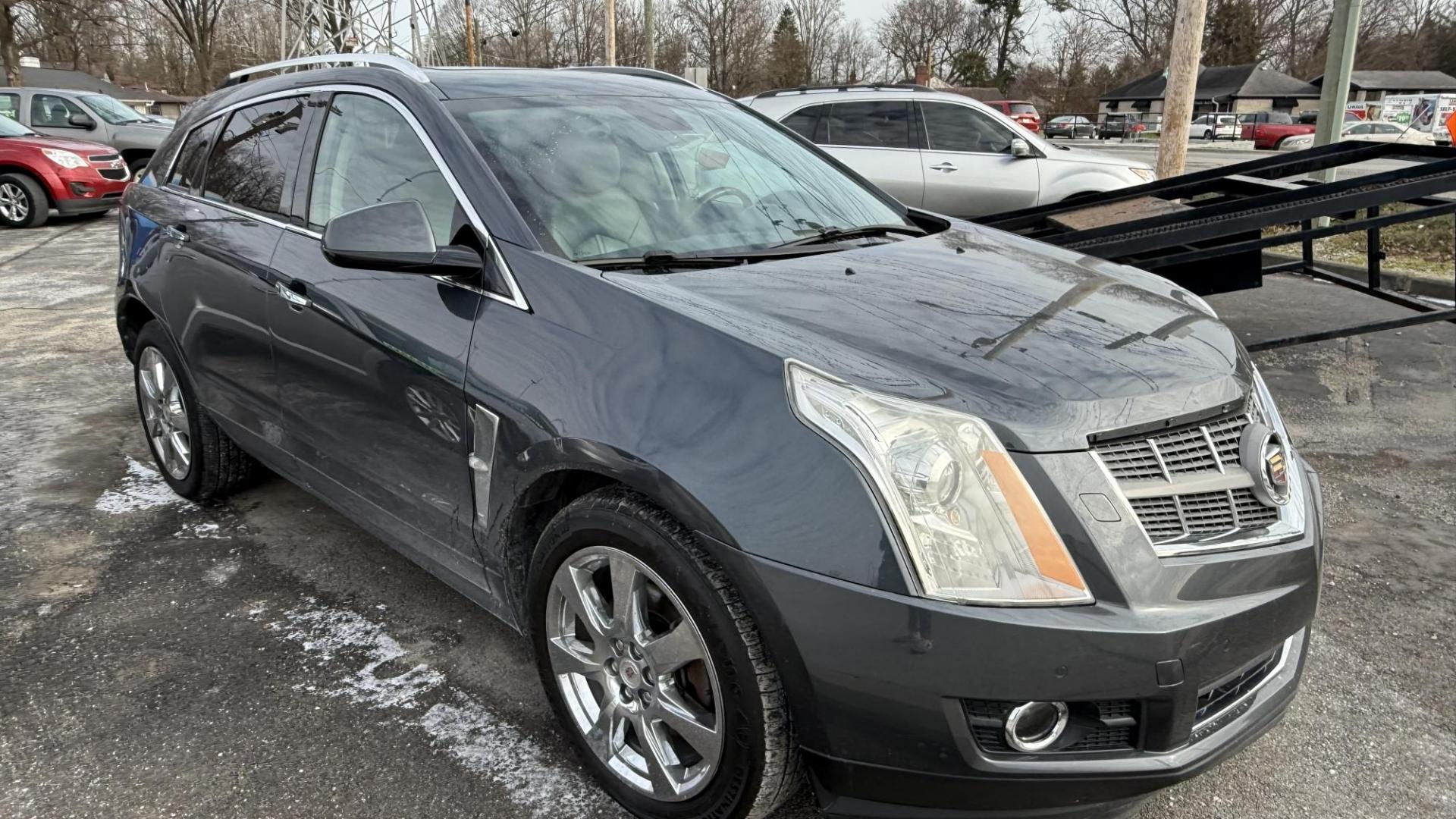 2011 BLUE Cadillac SRX Performance Collection AWD (3GYFNEEY5BS) with an 3.0L V6 DOHC 24V engine, 6-Speed Automatic transmission, located at 2710A Westlane Rd., Indianapolis, IN, 46268, (317) 291-2000, 39.885670, -86.208160 - Photo#1
