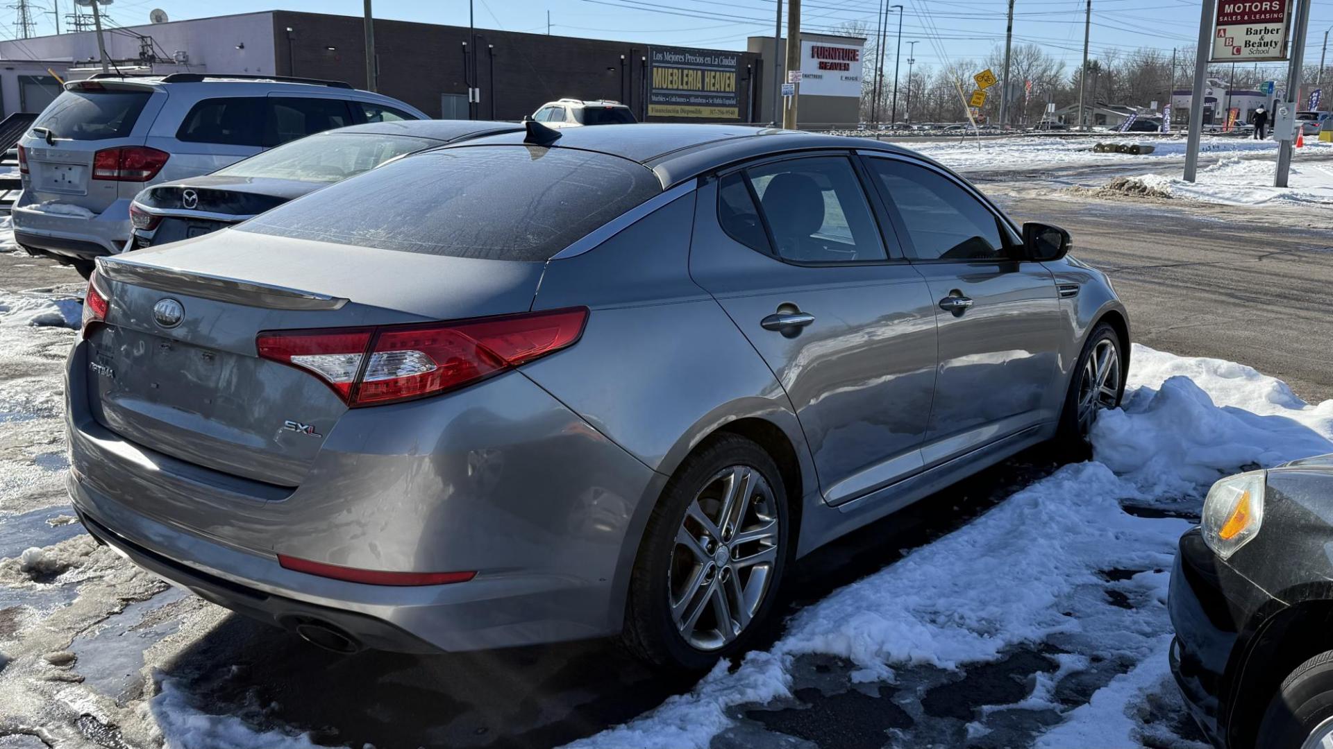 2013 BRONZE /BLACK Kia Optima SX (5XXGR4A69DG) with an 2.0L L4 DOHC 16V TURBO engine, 6-Speed Automatic transmission, located at 2710A Westlane Rd., Indianapolis, IN, 46268, (317) 291-2000, 39.885670, -86.208160 - Photo#3
