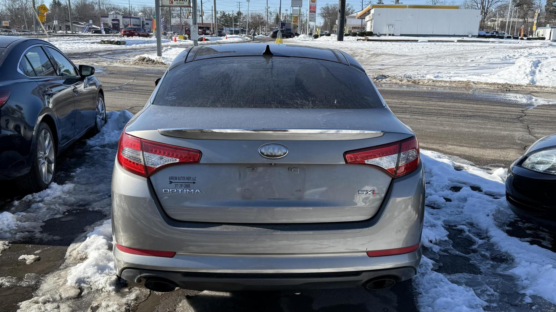 2013 BRONZE /BLACK Kia Optima SX (5XXGR4A69DG) with an 2.0L L4 DOHC 16V TURBO engine, 6-Speed Automatic transmission, located at 2710A Westlane Rd., Indianapolis, IN, 46268, (317) 291-2000, 39.885670, -86.208160 - Photo#4