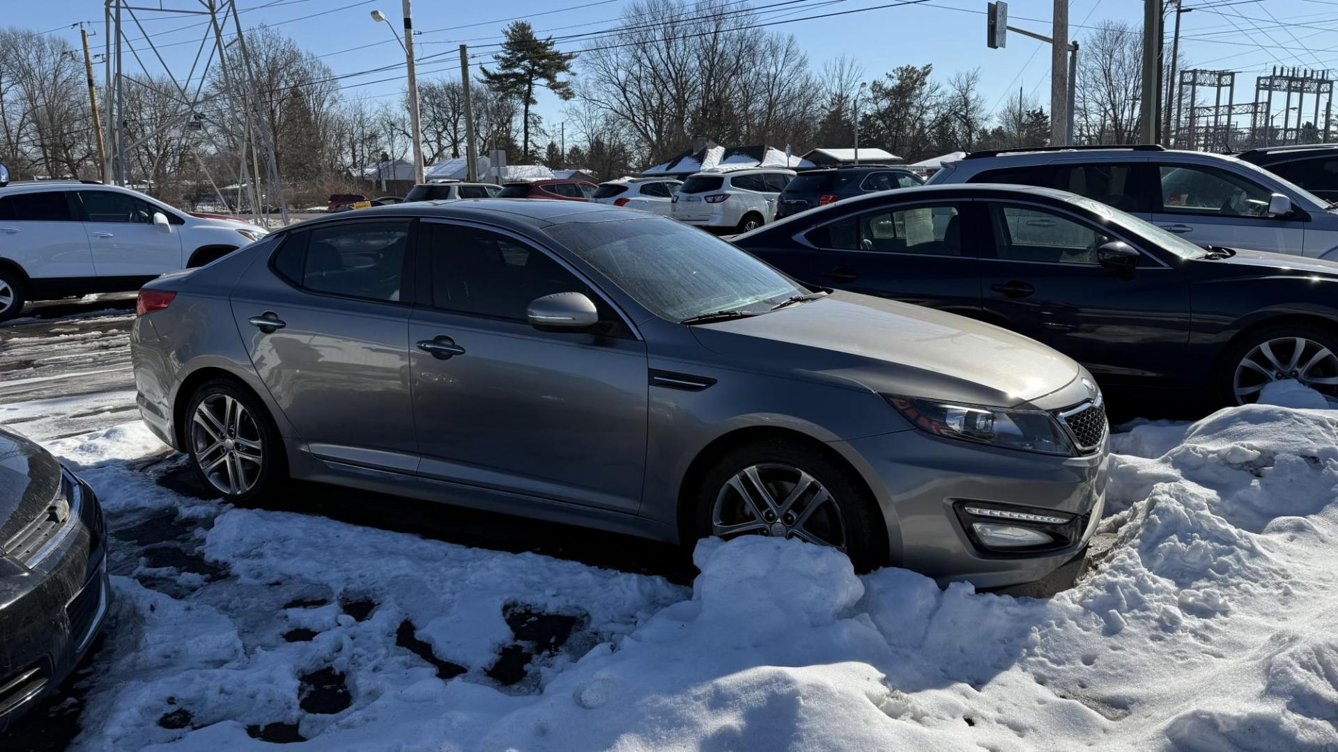 2013 BRONZE /BLACK Kia Optima SX (5XXGR4A69DG) with an 2.0L L4 DOHC 16V TURBO engine, 6-Speed Automatic transmission, located at 2710A Westlane Rd., Indianapolis, IN, 46268, (317) 291-2000, 39.885670, -86.208160 - Photo#2
