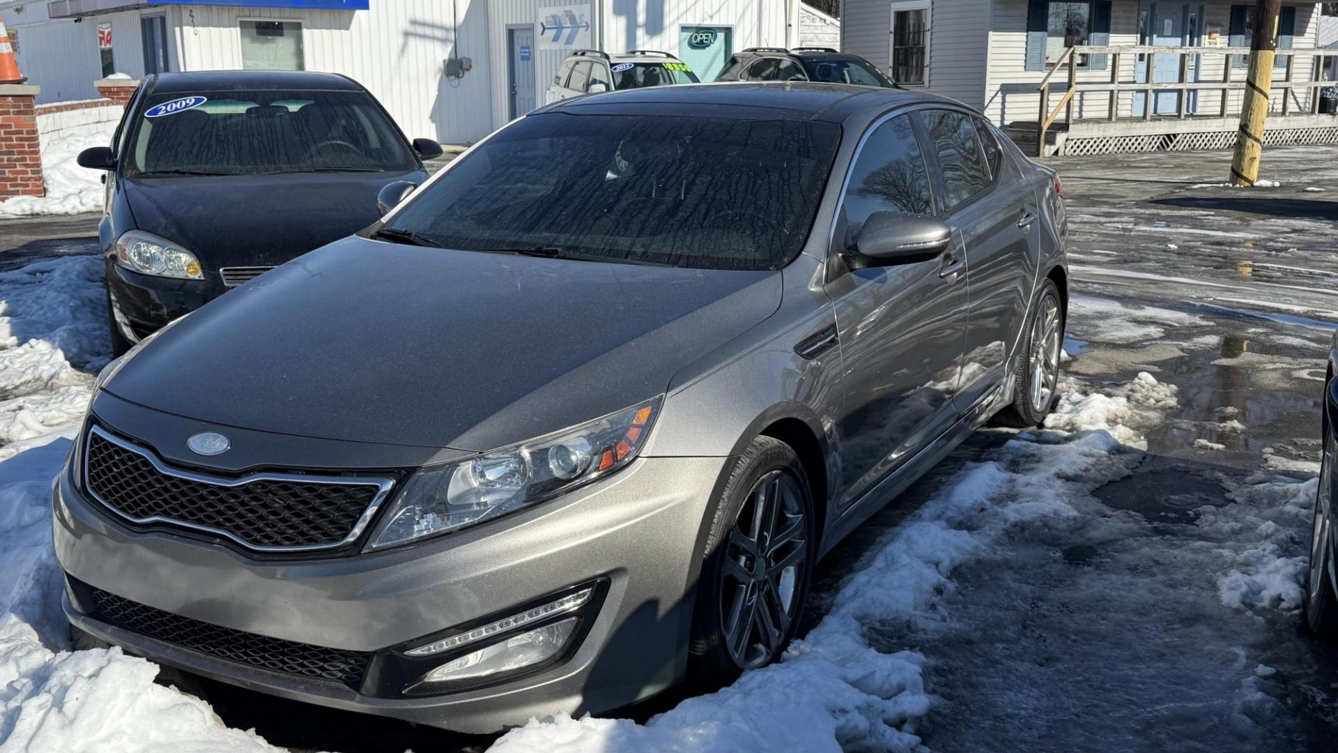2013 BRONZE /BLACK Kia Optima SX (5XXGR4A69DG) with an 2.0L L4 DOHC 16V TURBO engine, 6-Speed Automatic transmission, located at 2710A Westlane Rd., Indianapolis, IN, 46268, (317) 291-2000, 39.885670, -86.208160 - Photo#0