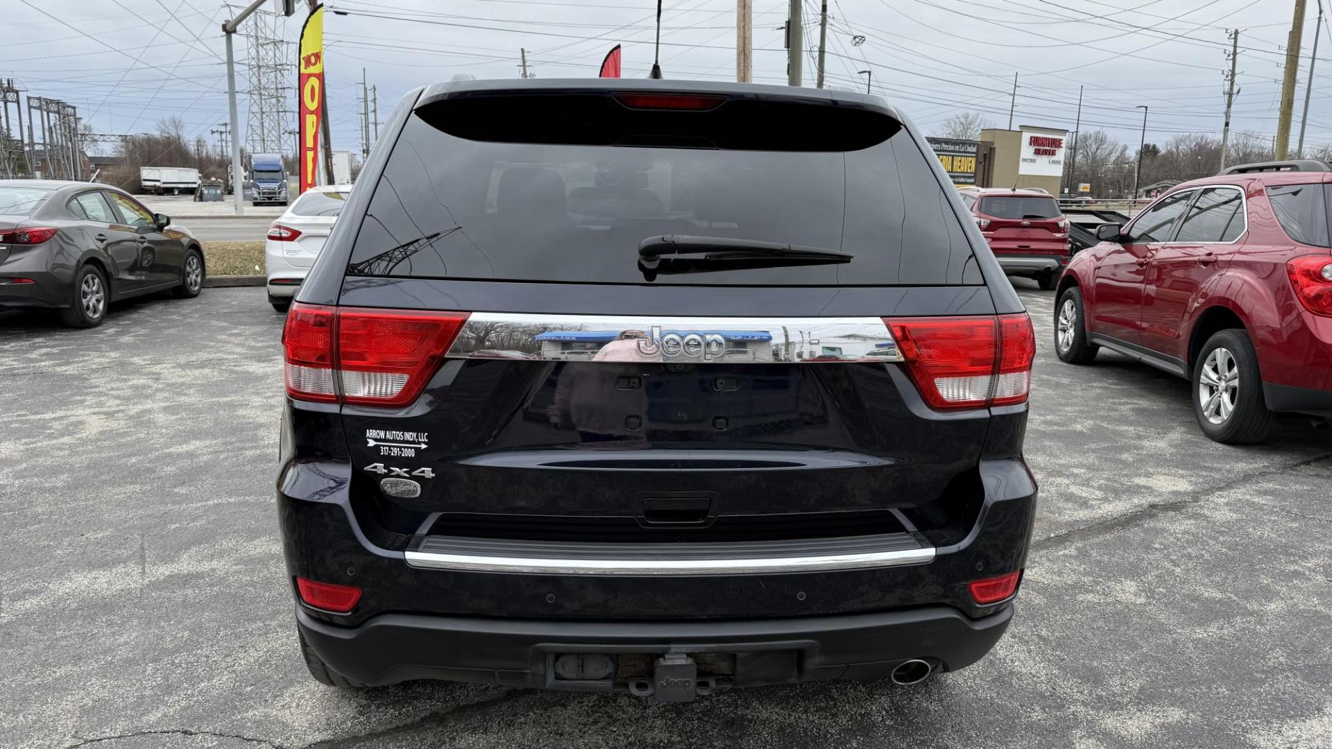 2011 DARK BLUE /BEIGE Jeep Grand Cherokee Overland 4WD (1J4RR6GG0BC) with an 3.6L V6 DOHC 24V engine, 5-Speed Automatic transmission, located at 2710A Westlane Rd., Indianapolis, IN, 46268, (317) 291-2000, 39.885670, -86.208160 - Photo#3