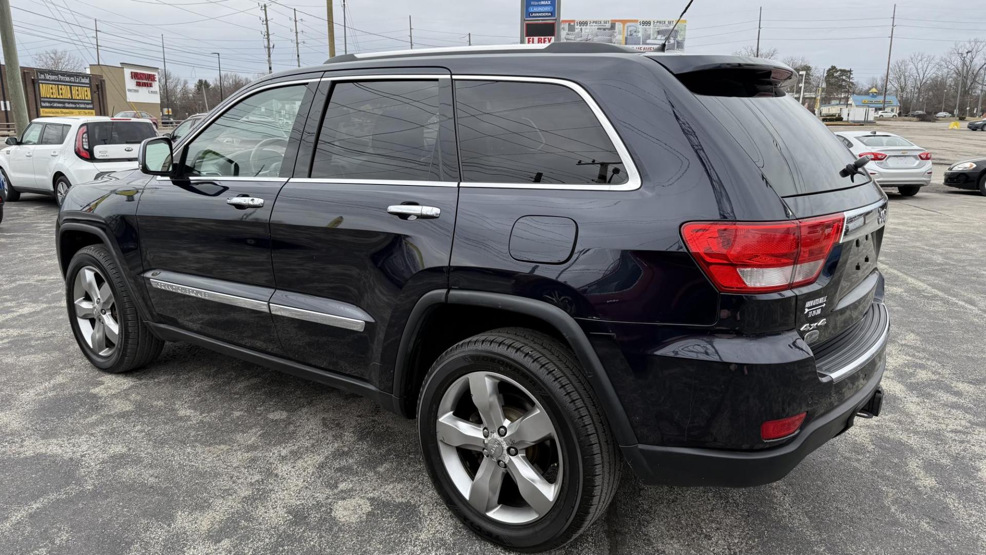 2011 DARK BLUE /BEIGE Jeep Grand Cherokee Overland 4WD (1J4RR6GG0BC) with an 3.6L V6 DOHC 24V engine, 5-Speed Automatic transmission, located at 2710A Westlane Rd., Indianapolis, IN, 46268, (317) 291-2000, 39.885670, -86.208160 - Photo#4