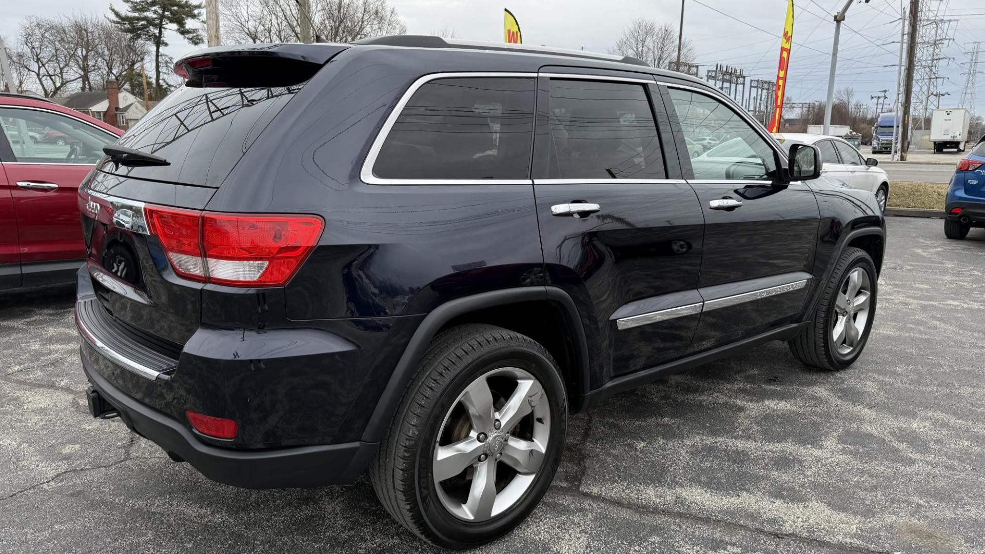 2011 DARK BLUE /BEIGE Jeep Grand Cherokee Overland 4WD (1J4RR6GG0BC) with an 3.6L V6 DOHC 24V engine, 5-Speed Automatic transmission, located at 2710A Westlane Rd., Indianapolis, IN, 46268, (317) 291-2000, 39.885670, -86.208160 - Photo#5