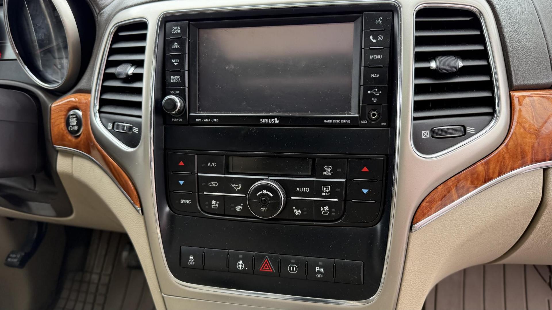 2011 DARK BLUE /BEIGE Jeep Grand Cherokee Overland 4WD (1J4RR6GG0BC) with an 3.6L V6 DOHC 24V engine, 5-Speed Automatic transmission, located at 2710A Westlane Rd., Indianapolis, IN, 46268, (317) 291-2000, 39.885670, -86.208160 - Photo#8