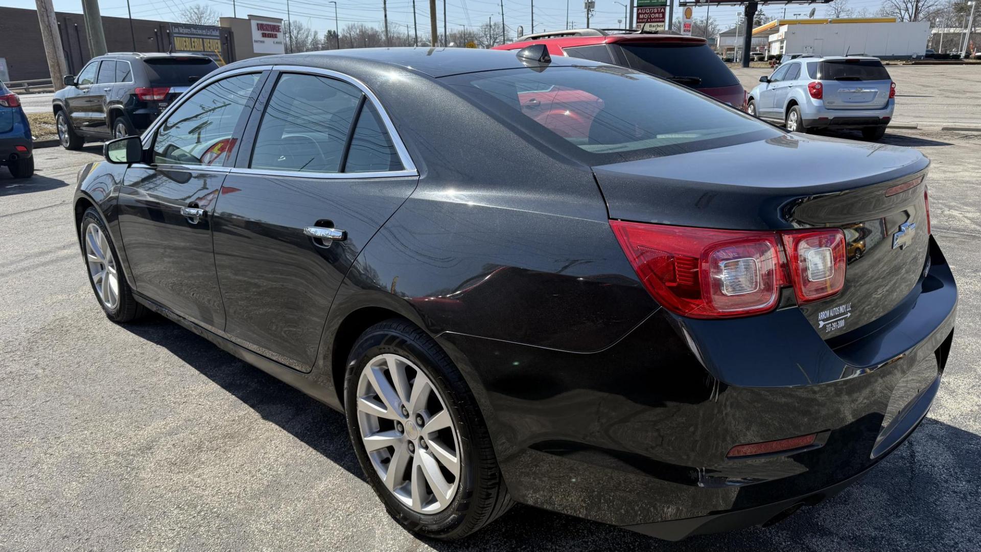 2013 BLACK /BLACK Chevrolet Malibu LTZ (1G11H5SA5DF) with an 2.5L L4 DOHC 16V engine, 6-Speed Automatic transmission, located at 2710A Westlane Rd., Indianapolis, IN, 46268, (317) 291-2000, 39.885670, -86.208160 - Photo#5