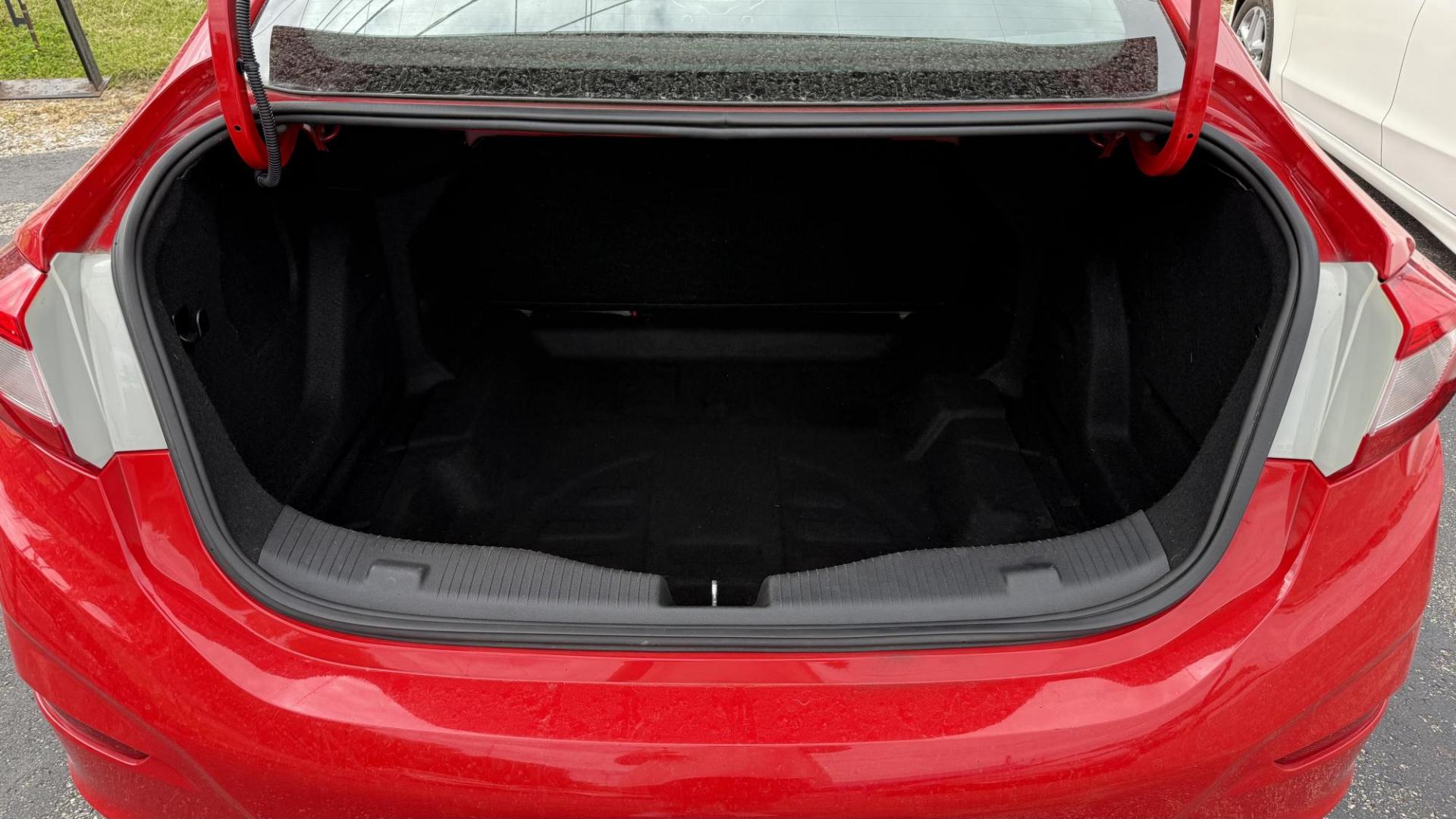 2016 RED /GRAY Chevrolet Cruze LS Auto (1G1BC5SM3G7) with an 1.4L L4 DOHC 16V TURBO engine, 6A transmission, located at 2710A Westlane Rd., Indianapolis, IN, 46268, (317) 291-2000, 39.885670, -86.208160 - Photo#5