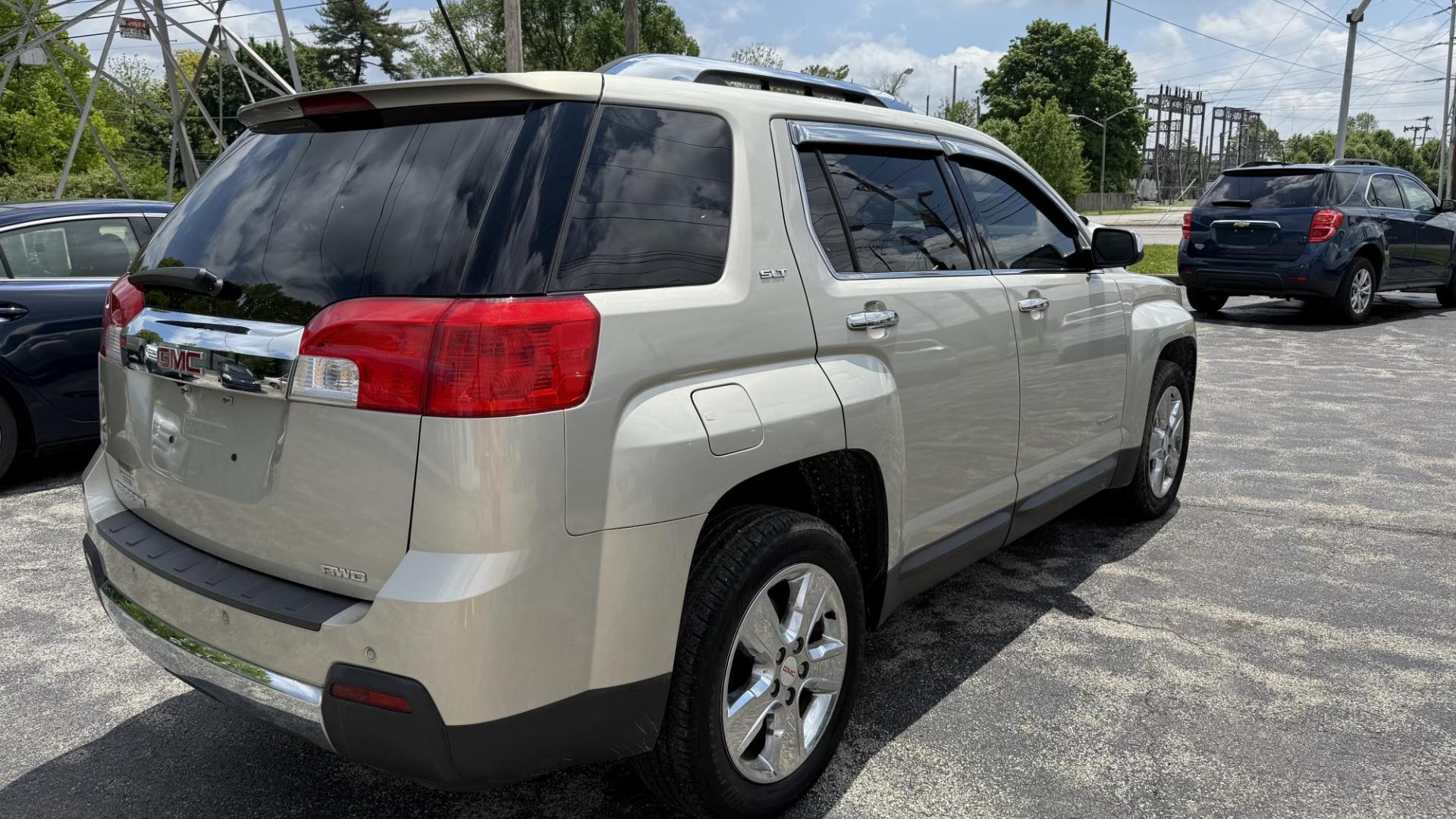 2015 GOLD /TAN/BROWN GMC Terrain SLT2 AWD (2GKFLYEK5F6) with an 2.4L L4 DOHC 16V FFV engine, 6-Speed Automatic transmission, located at 2710A Westlane Rd., Indianapolis, IN, 46268, (317) 291-2000, 39.885670, -86.208160 - Photo#4
