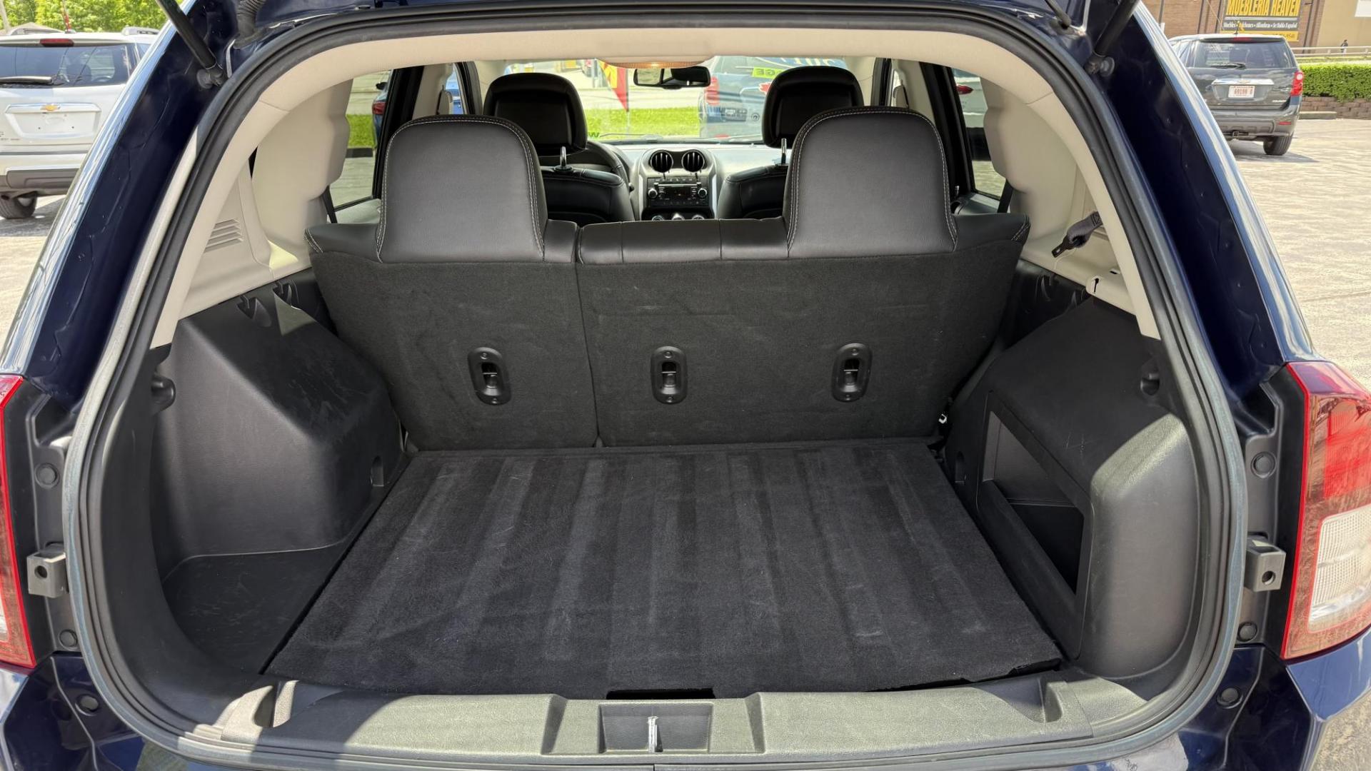 2017 BLUE /BLACK Jeep Compass Latitude 4WD (1C4NJDEB0HD) with an 2.4L L4 DOHC 16V engine, 6A transmission, located at 2710A Westlane Rd., Indianapolis, IN, 46268, (317) 291-2000, 39.885670, -86.208160 - Photo#7