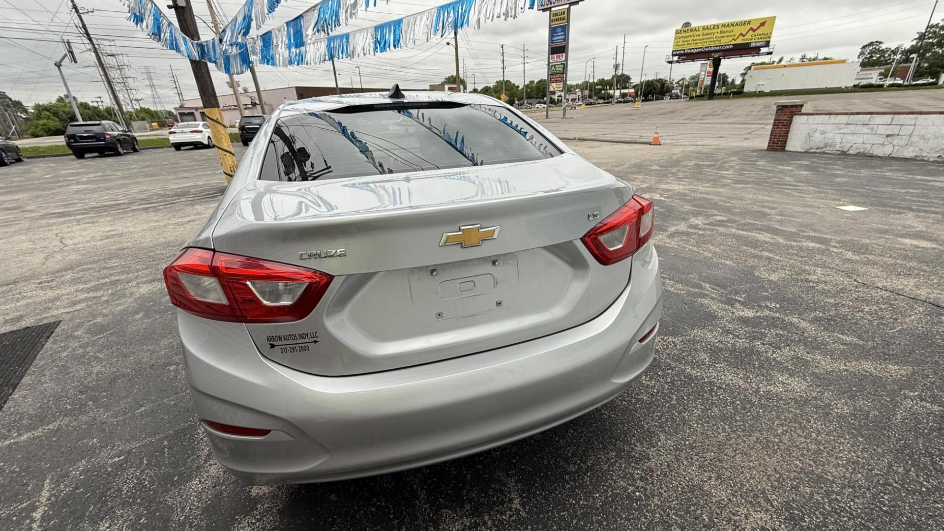 2016 Silver /BLACK Chevrolet Cruze LS Auto (1G1BC5SM8G7) with an 1.4L L4 DOHC 16V TURBO engine, 6A transmission, located at 2710A Westlane Rd., Indianapolis, IN, 46268, (317) 291-2000, 39.885670, -86.208160 - Photo#5