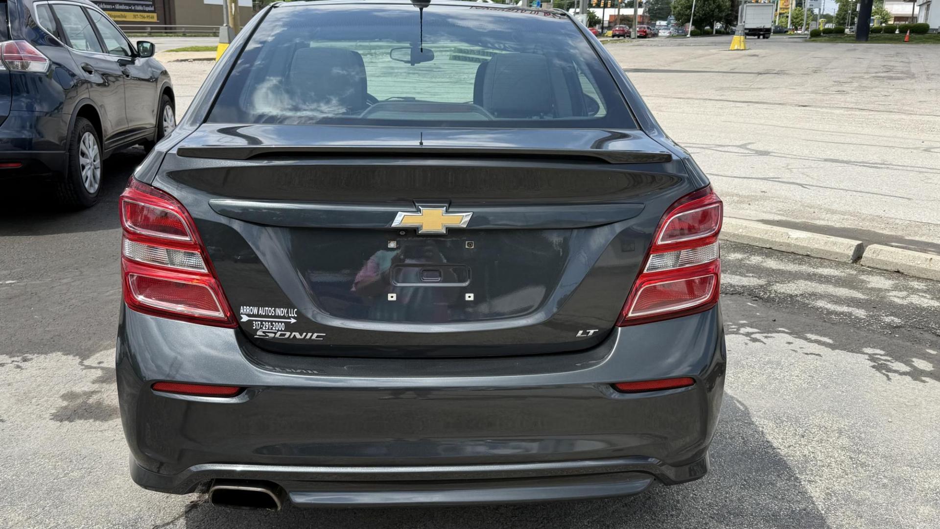 2017 GRAY /GRAY Chevrolet Sonic LT Manual Sedan (1G1JD5SHXH4) with an 1.8L L4 DOHC 24V engine, 5M transmission, located at 2710A Westlane Rd., Indianapolis, IN, 46268, (317) 291-2000, 39.885670, -86.208160 - Photo#4