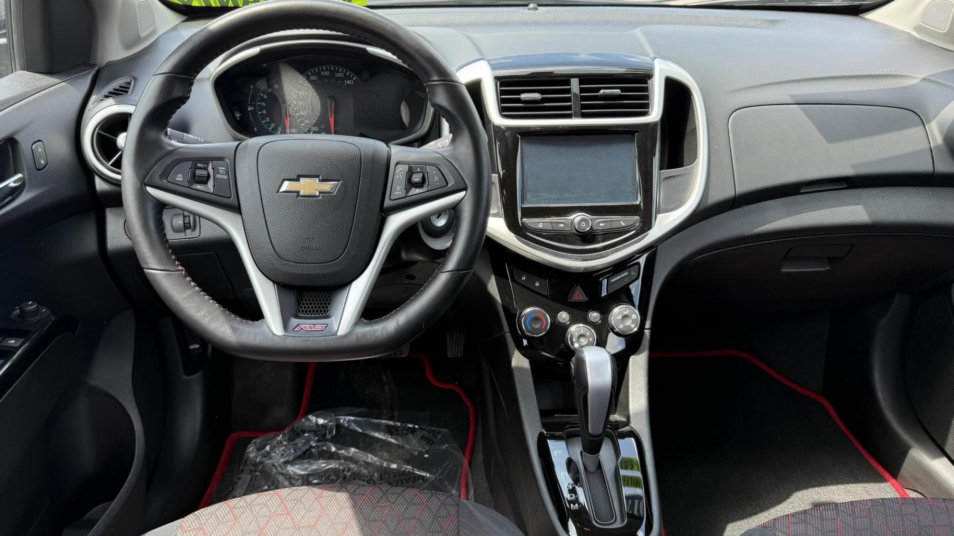 2017 GRAY /GRAY Chevrolet Sonic LT Manual Sedan (1G1JD5SHXH4) with an 1.8L L4 DOHC 24V engine, 5M transmission, located at 2710A Westlane Rd., Indianapolis, IN, 46268, (317) 291-2000, 39.885670, -86.208160 - Photo#6