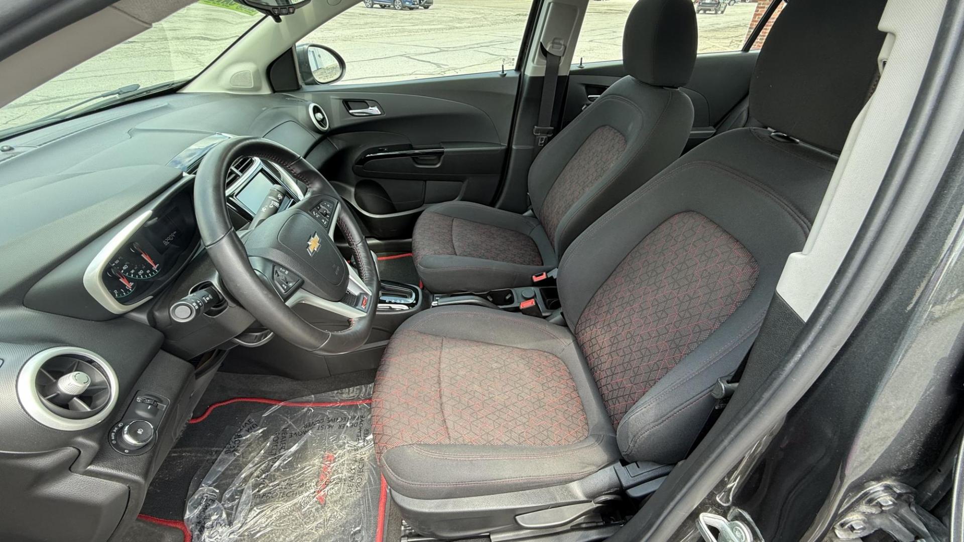 2017 GRAY /GRAY Chevrolet Sonic LT Manual Sedan (1G1JD5SHXH4) with an 1.8L L4 DOHC 24V engine, 5M transmission, located at 2710A Westlane Rd., Indianapolis, IN, 46268, (317) 291-2000, 39.885670, -86.208160 - Photo#7