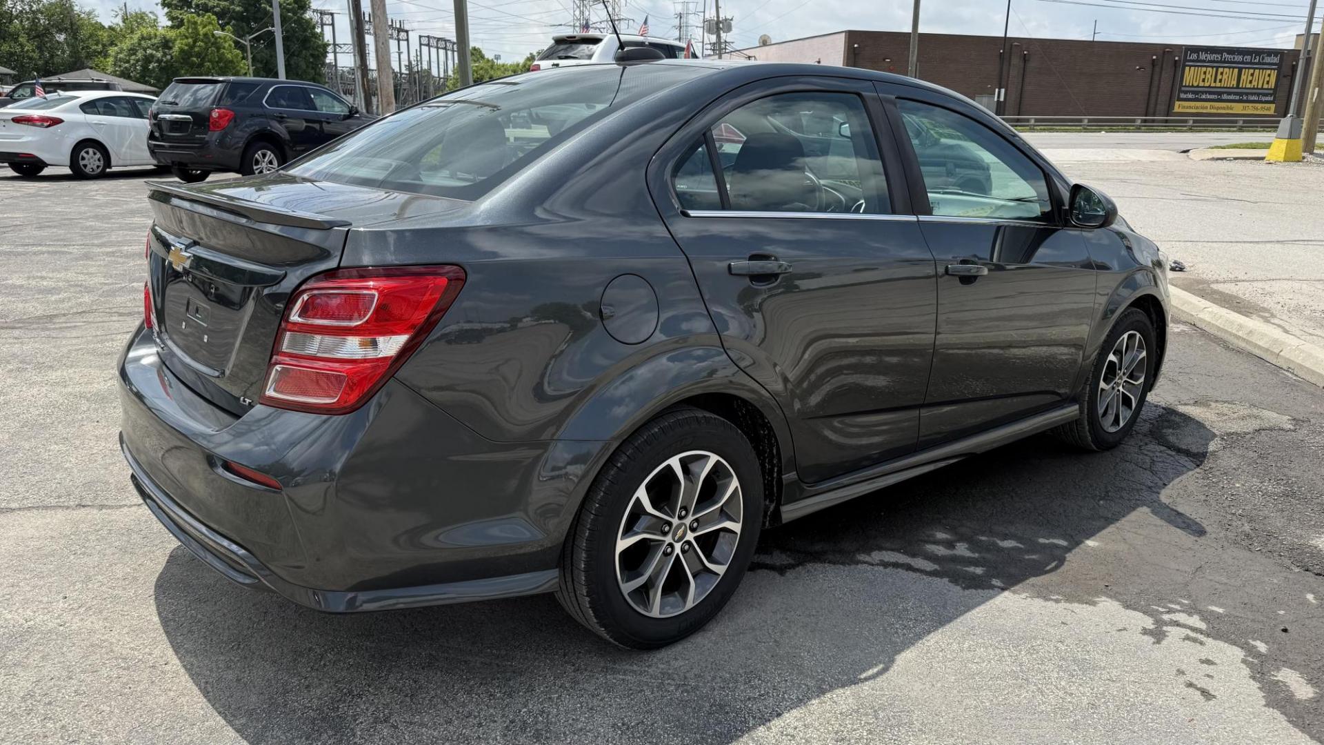 2017 GRAY /GRAY Chevrolet Sonic LT Manual Sedan (1G1JD5SHXH4) with an 1.8L L4 DOHC 24V engine, 5M transmission, located at 2710A Westlane Rd., Indianapolis, IN, 46268, (317) 291-2000, 39.885670, -86.208160 - Photo#5