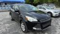 2016 BLACK /GRAY Ford Escape SE FWD (1FMCU0G76GU) with an 2.5L L4 DOHC 16V engine, 6-Speed Automatic transmission, located at 2710A Westlane Rd., Indianapolis, IN, 46268, (317) 291-2000, 39.885670, -86.208160 - Photo#0