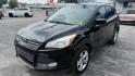 2016 BLACK /GRAY Ford Escape SE FWD (1FMCU0G76GU) with an 2.5L L4 DOHC 16V engine, 6-Speed Automatic transmission, located at 2710A Westlane Rd., Indianapolis, IN, 46268, (317) 291-2000, 39.885670, -86.208160 - Photo#1
