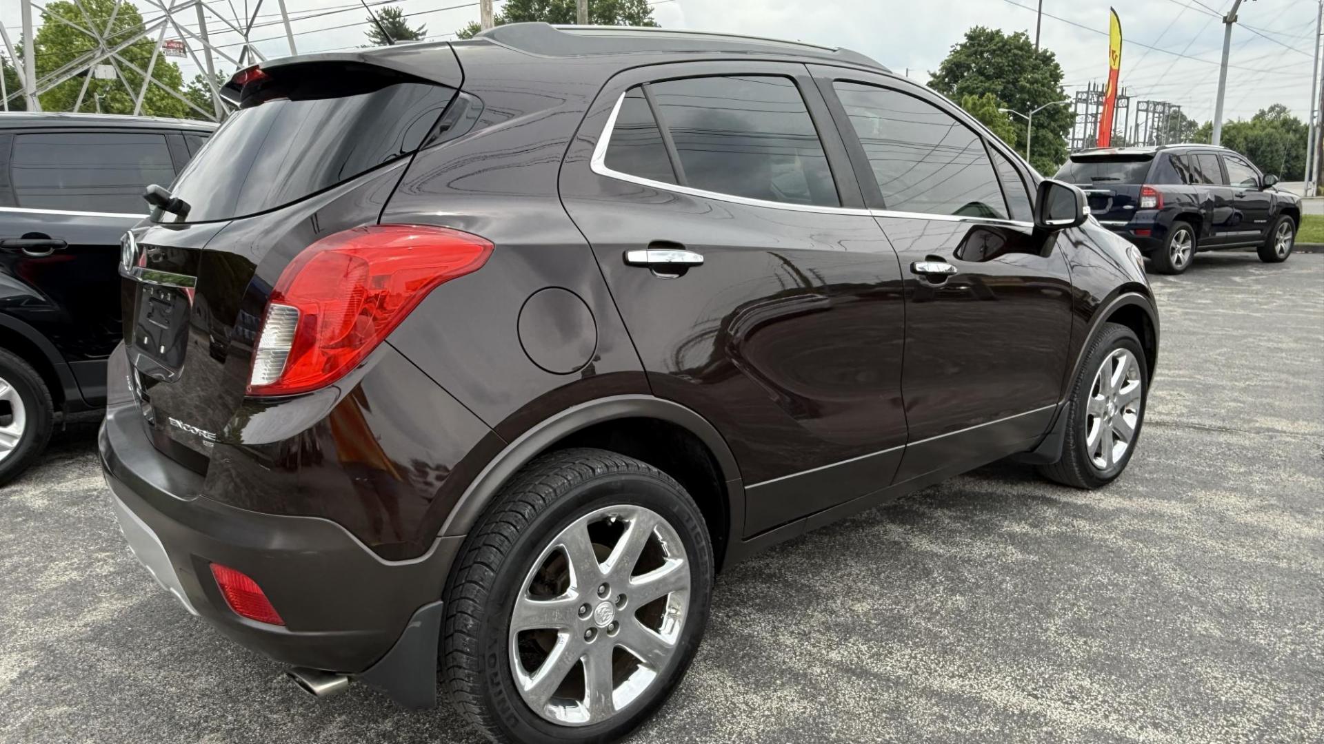 2016 BROWN /BLACK Buick Encore Leather AWD (KL4CJGSB5GB) with an 1.4L L4 DOHC 16V TURBO engine, 6A transmission, located at 2710A Westlane Rd., Indianapolis, IN, 46268, (317) 291-2000, 39.885670, -86.208160 - Photo#3