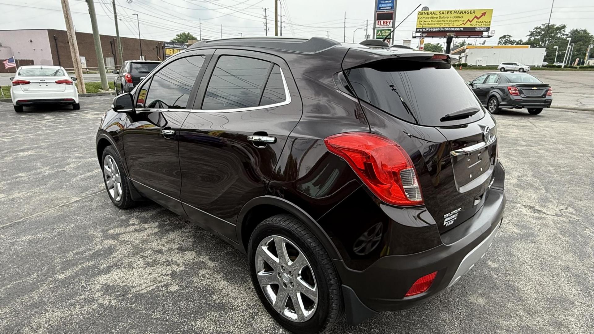 2016 BROWN /BLACK Buick Encore Leather AWD (KL4CJGSB5GB) with an 1.4L L4 DOHC 16V TURBO engine, 6A transmission, located at 2710A Westlane Rd., Indianapolis, IN, 46268, (317) 291-2000, 39.885670, -86.208160 - Photo#4