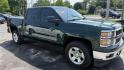 2015 GREEN /GRAY Chevrolet Silverado 1500 LT Crew Cab 4WD Z71 (3GCUKREC5FG) with an 5.3L V8 OHV 16V engine, 6-Speed Automatic transmission, located at 2710A Westlane Rd., Indianapolis, IN, 46268, (317) 291-2000, 39.885670, -86.208160 - Photo#1