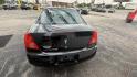 2009 BLACK /BLACK Pontiac G6 Sedan (1G2ZG57BX94) with an 2.4L L4 DOHC 16V engine, 4-Speed Automatic Overdrive transmission, located at 2710A Westlane Rd., Indianapolis, IN, 46268, (317) 291-2000, 39.885670, -86.208160 - Photo#6