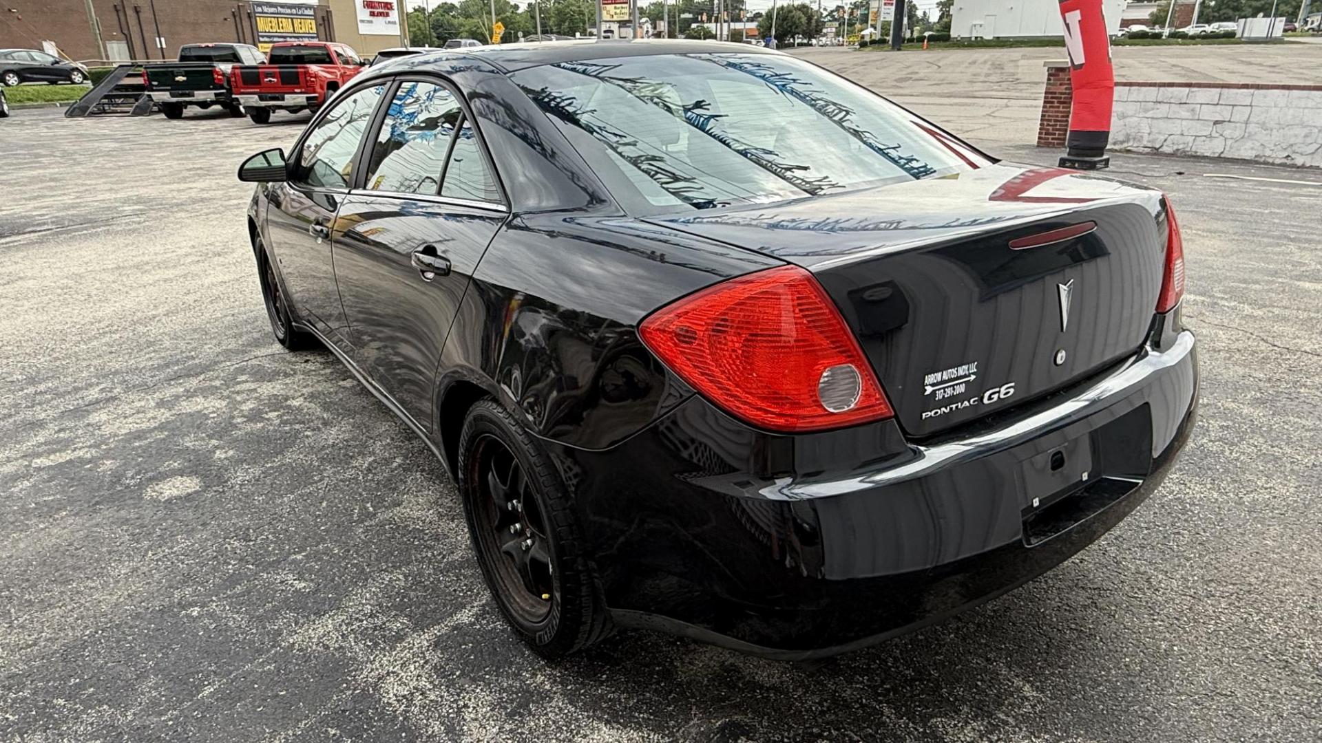2009 BLACK /BLACK Pontiac G6 Sedan (1G2ZG57BX94) with an 2.4L L4 DOHC 16V engine, 4-Speed Automatic Overdrive transmission, located at 2710A Westlane Rd., Indianapolis, IN, 46268, (317) 291-2000, 39.885670, -86.208160 - Photo#4