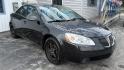 2009 BLACK /BLACK Pontiac G6 Sedan (1G2ZG57BX94) with an 2.4L L4 DOHC 16V engine, 4-Speed Automatic Overdrive transmission, located at 2710A Westlane Rd., Indianapolis, IN, 46268, (317) 291-2000, 39.885670, -86.208160 - Photo#1