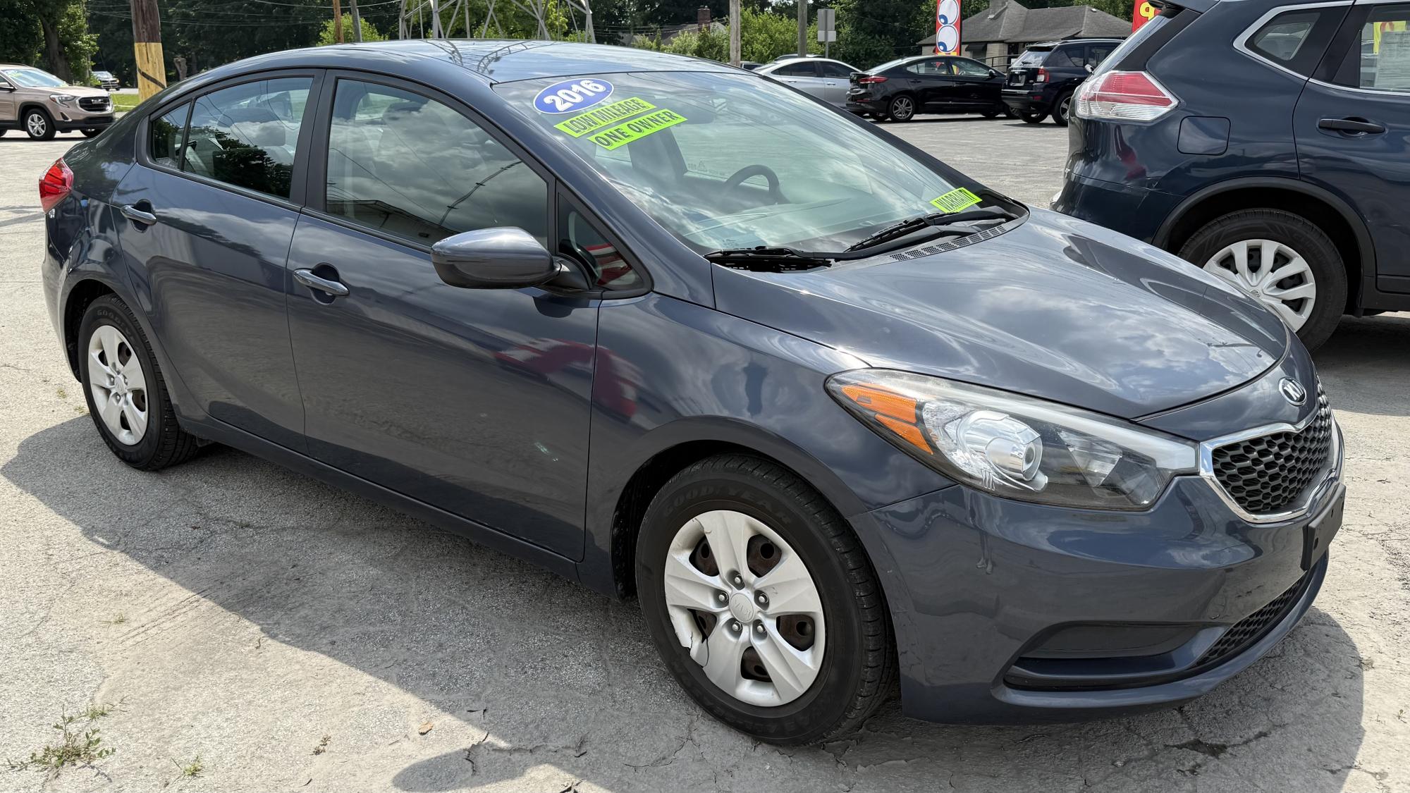 photo of 2016 Kia Forte LX w/Popular Package / OUTSIDE FINANCE / WARRANTY, GAP. ROADSIDE ASSISTANCE AVAILABLE