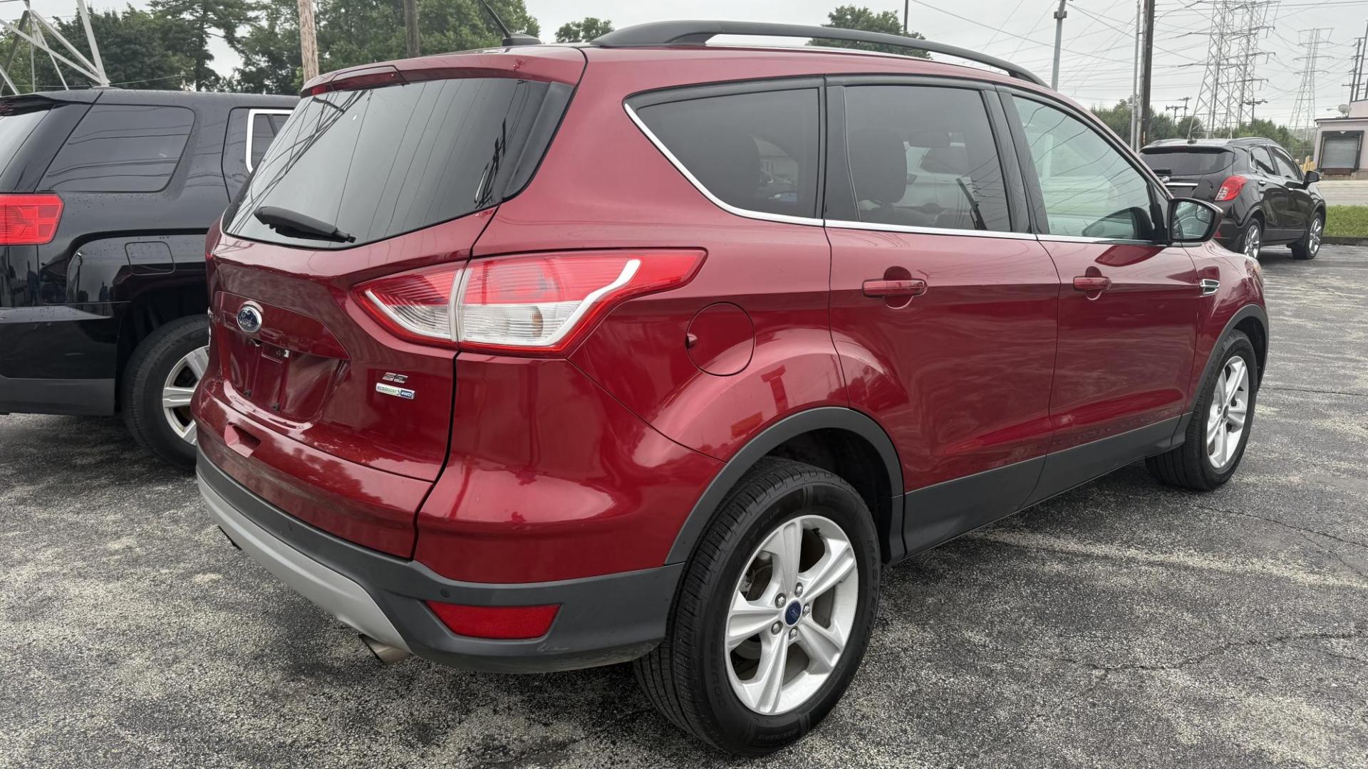 2015 RED /TAN Ford Escape SE 4WD (1FMCU9GX1FU) with an 1.6L L4 DOHC 16V engine, 6-Speed Automatic transmission, located at 2710A Westlane Rd., Indianapolis, IN, 46268, (317) 291-2000, 39.885670, -86.208160 - Photo#4
