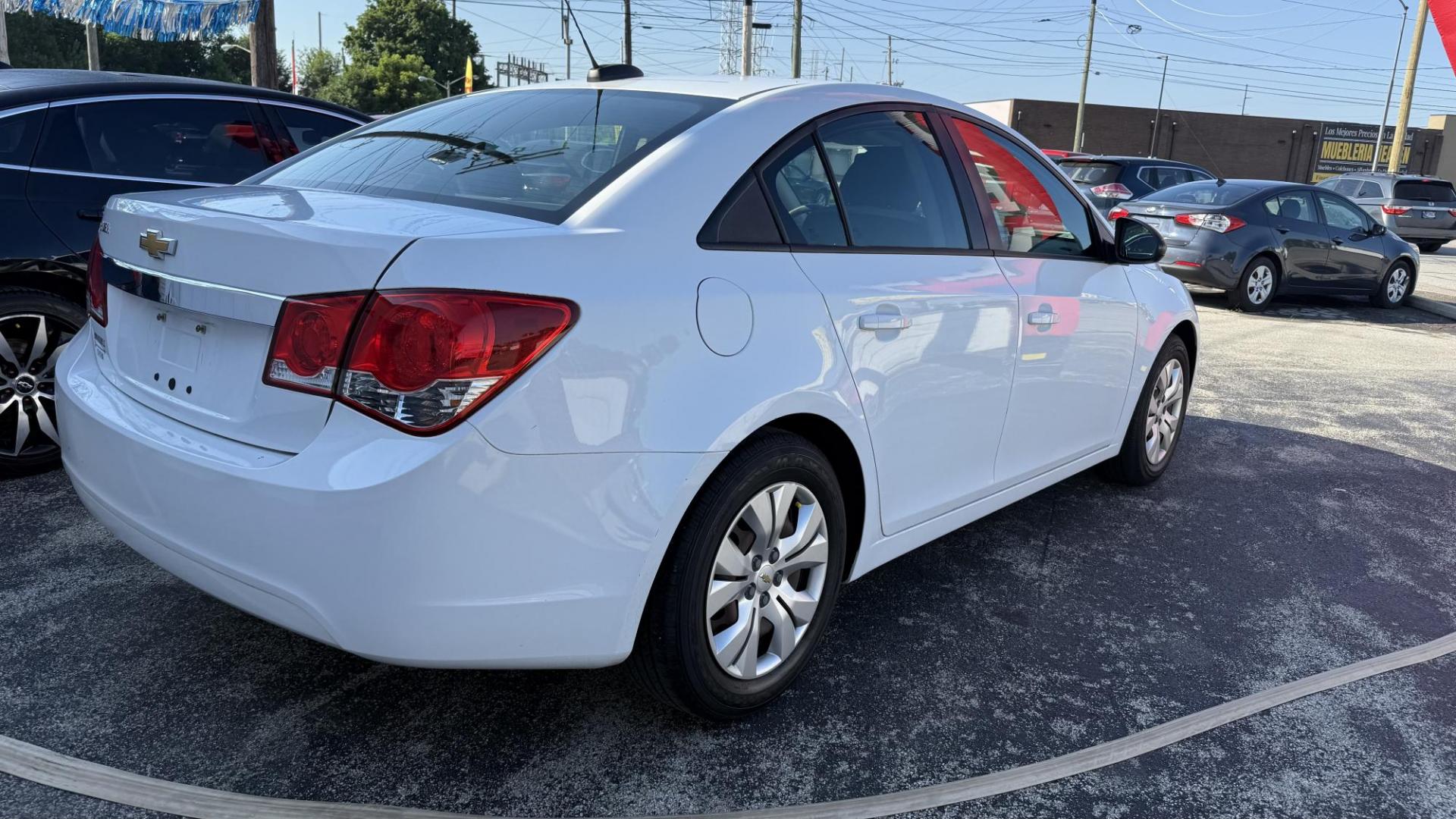 2016 WHITE /GRAY Chevrolet Cruze Limited LS Auto (1G1PC5SH6G7) with an 1.8L L4 DOHC 16V FFV engine, 6A transmission, located at 2710A Westlane Rd., Indianapolis, IN, 46268, (317) 291-2000, 39.885670, -86.208160 - Photo#3