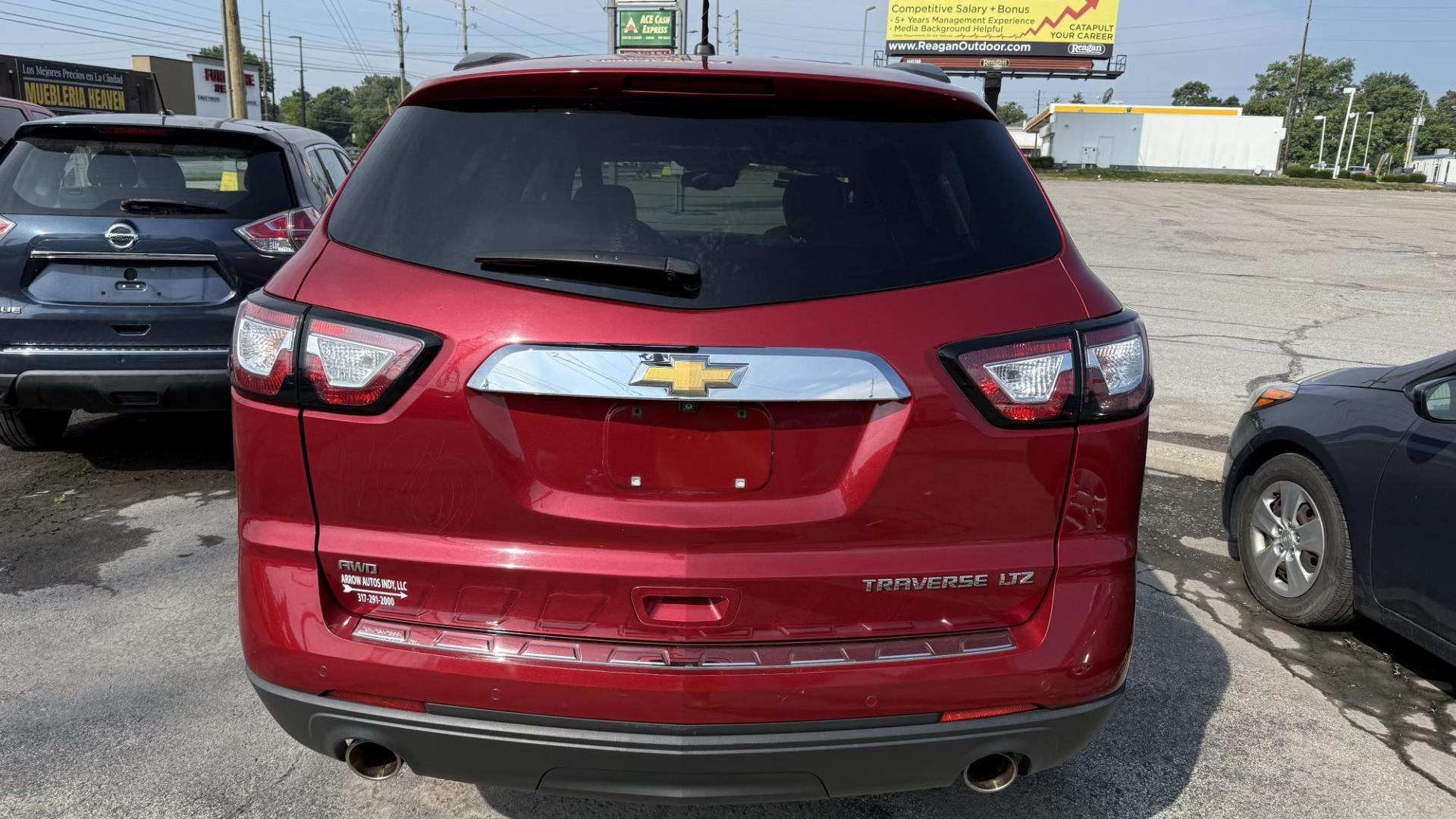 2014 RED /TAN Chevrolet Traverse LTZ AWD (1GNKVJKD1EJ) with an 3.6L V6 DOHC 24V engine, 6-Speed Automatic transmission, located at 2710A Westlane Rd., Indianapolis, IN, 46268, (317) 291-2000, 39.885670, -86.208160 - Photo#6
