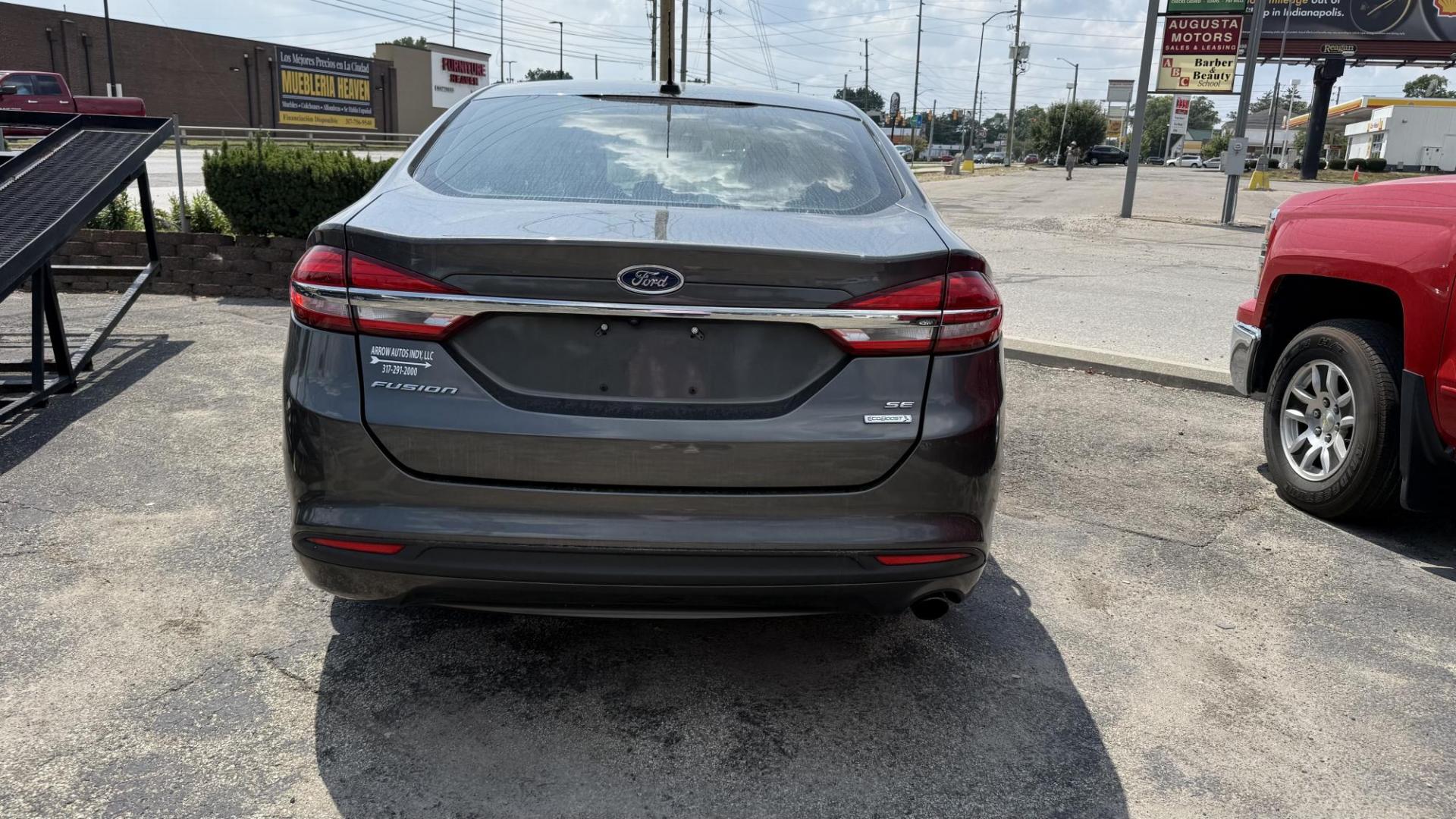 2017 GRAY /TAN Ford Fusion SE (3FA6P0HD8HR) with an 1.5L L4 DOHC 16V engine, 6A transmission, located at 2710A Westlane Rd., Indianapolis, IN, 46268, (317) 291-2000, 39.885670, -86.208160 - Photo#3