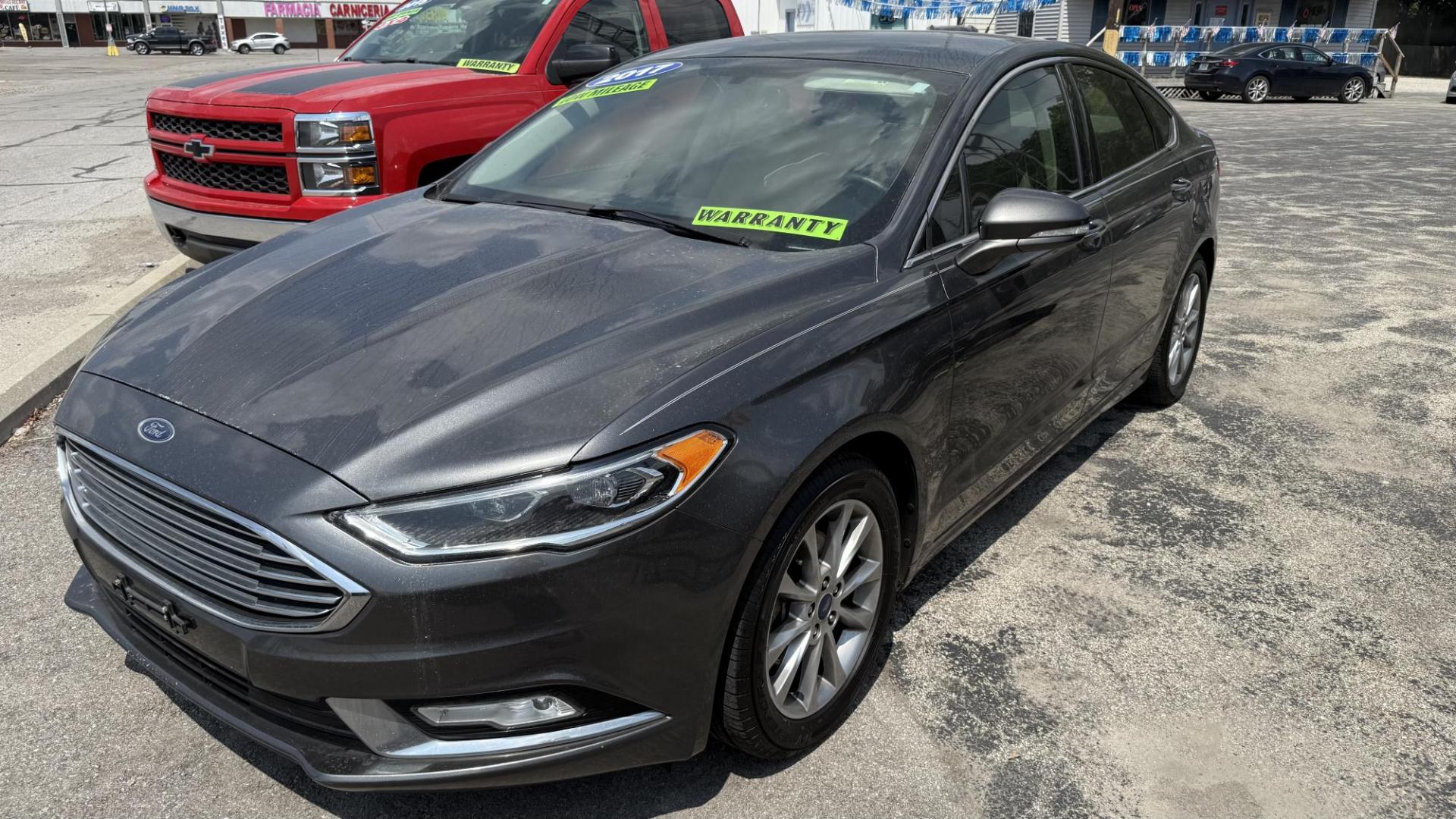 2017 GRAY /TAN Ford Fusion SE (3FA6P0HD8HR) with an 1.5L L4 DOHC 16V engine, 6A transmission, located at 2710A Westlane Rd., Indianapolis, IN, 46268, (317) 291-2000, 39.885670, -86.208160 - Photo#1