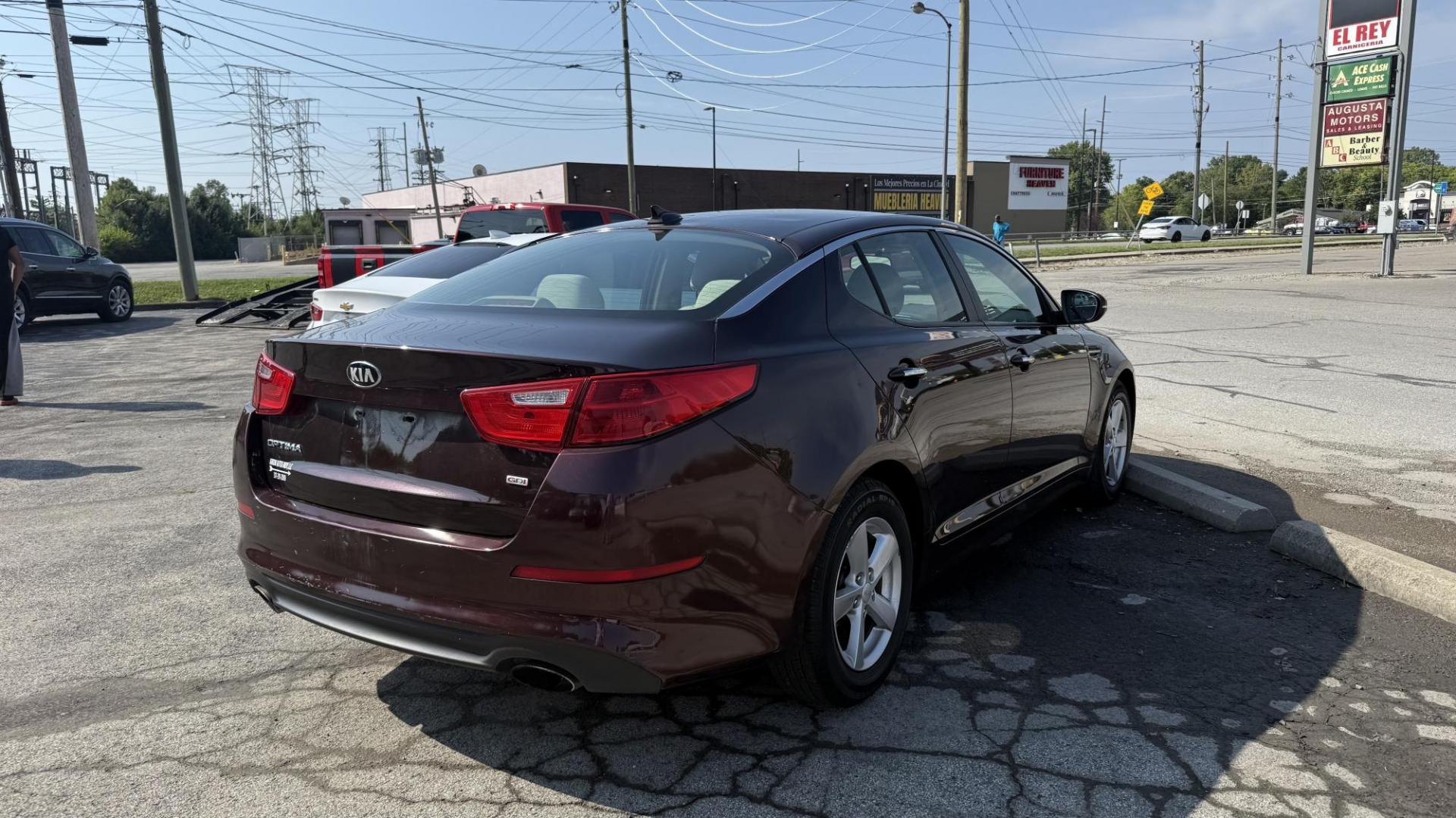 2015 MAROON /BEIGE Kia Optima LX (5XXGM4A71FG) with an 2.4L L4 DOHC 16V engine, 6-Speed Automatic transmission, located at 2710A Westlane Rd., Indianapolis, IN, 46268, (317) 291-2000, 39.885670, -86.208160 - Photo#3