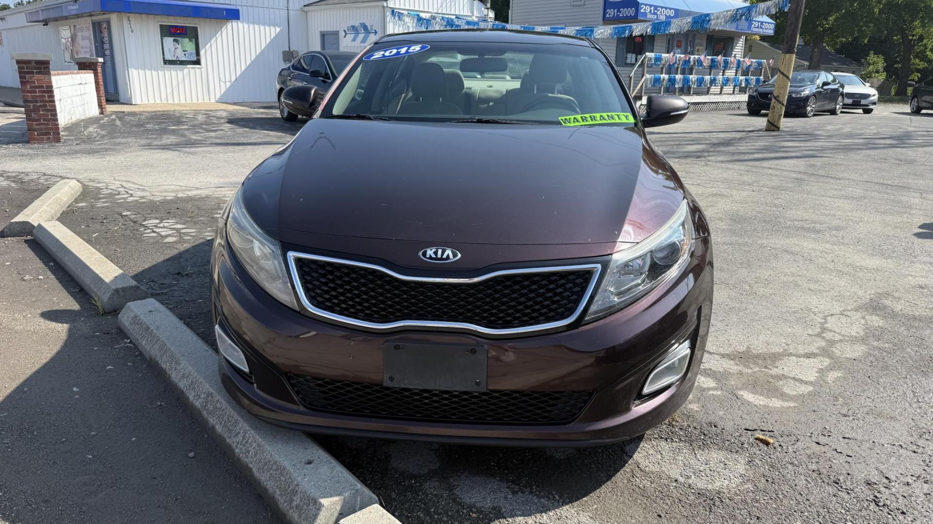 2015 MAROON /BEIGE Kia Optima LX (5XXGM4A71FG) with an 2.4L L4 DOHC 16V engine, 6-Speed Automatic transmission, located at 2710A Westlane Rd., Indianapolis, IN, 46268, (317) 291-2000, 39.885670, -86.208160 - Photo#2