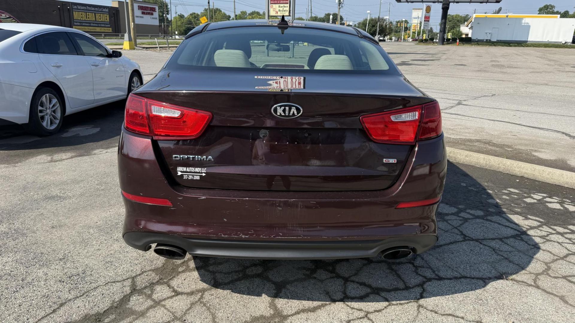 2015 MAROON /BEIGE Kia Optima LX (5XXGM4A71FG) with an 2.4L L4 DOHC 16V engine, 6-Speed Automatic transmission, located at 2710A Westlane Rd., Indianapolis, IN, 46268, (317) 291-2000, 39.885670, -86.208160 - Photo#4