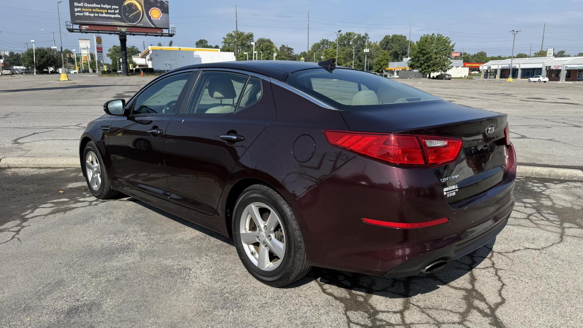 2015 MAROON /BEIGE Kia Optima LX (5XXGM4A71FG) with an 2.4L L4 DOHC 16V engine, 6-Speed Automatic transmission, located at 2710A Westlane Rd., Indianapolis, IN, 46268, (317) 291-2000, 39.885670, -86.208160 - Photo#5
