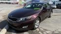 2015 MAROON /BEIGE Kia Optima LX (5XXGM4A71FG) with an 2.4L L4 DOHC 16V engine, 6-Speed Automatic transmission, located at 2710A Westlane Rd., Indianapolis, IN, 46268, (317) 291-2000, 39.885670, -86.208160 - Photo#1