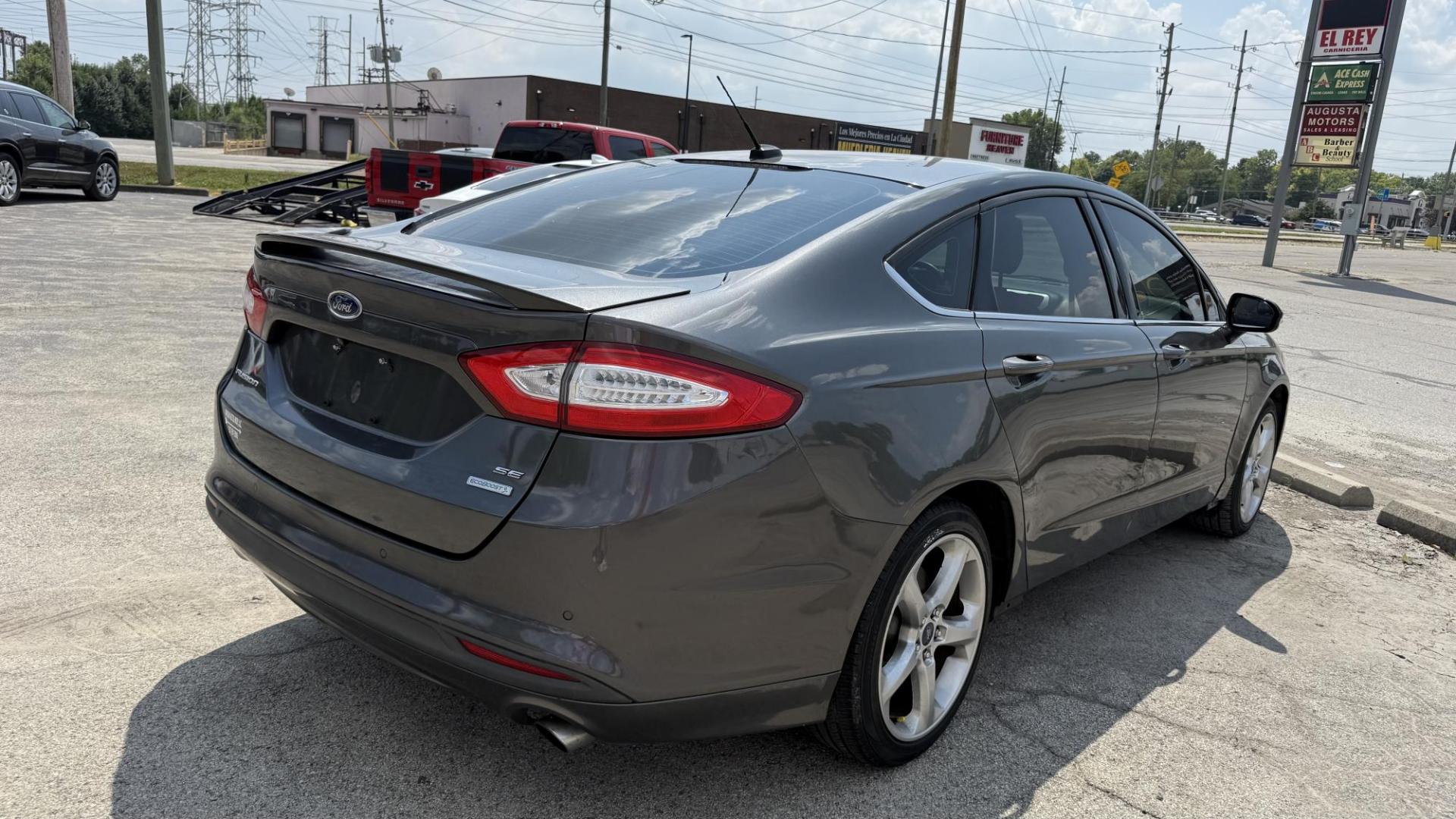 2016 GRAY /GRAY/BLACK Ford Fusion SE (3FA6P0HD3GR) with an 1.5L L4 DOHC 16V engine, 6-Speed Automatic transmission, located at 2710A Westlane Rd., Indianapolis, IN, 46268, (317) 291-2000, 39.885670, -86.208160 - Photo#3
