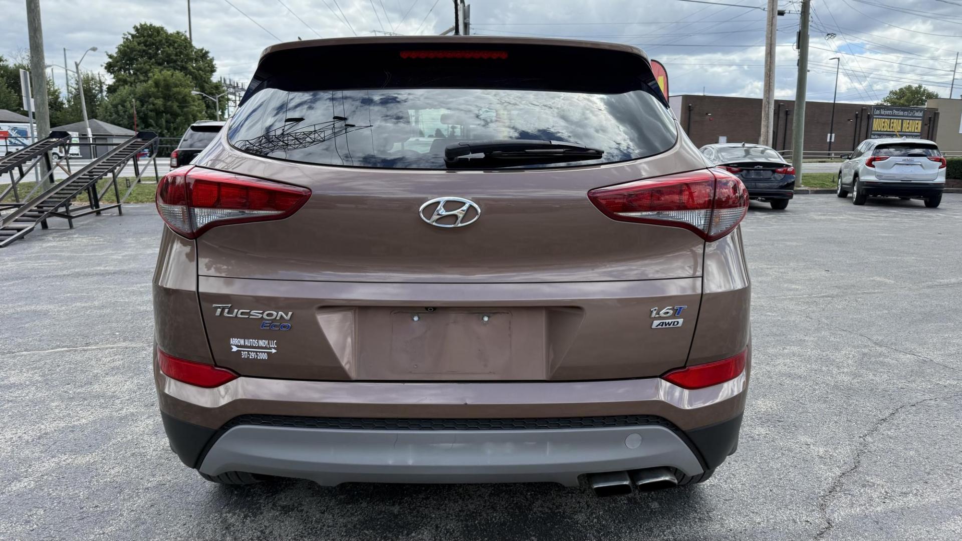 2017 BROWN /TAN Hyundai Tucson Eco AWD (KM8J3CA29HU) with an 1.6L L4 DOHC 16V engine, 7A transmission, located at 2710A Westlane Rd., Indianapolis, IN, 46268, (317) 291-2000, 39.885670, -86.208160 - Photo#4