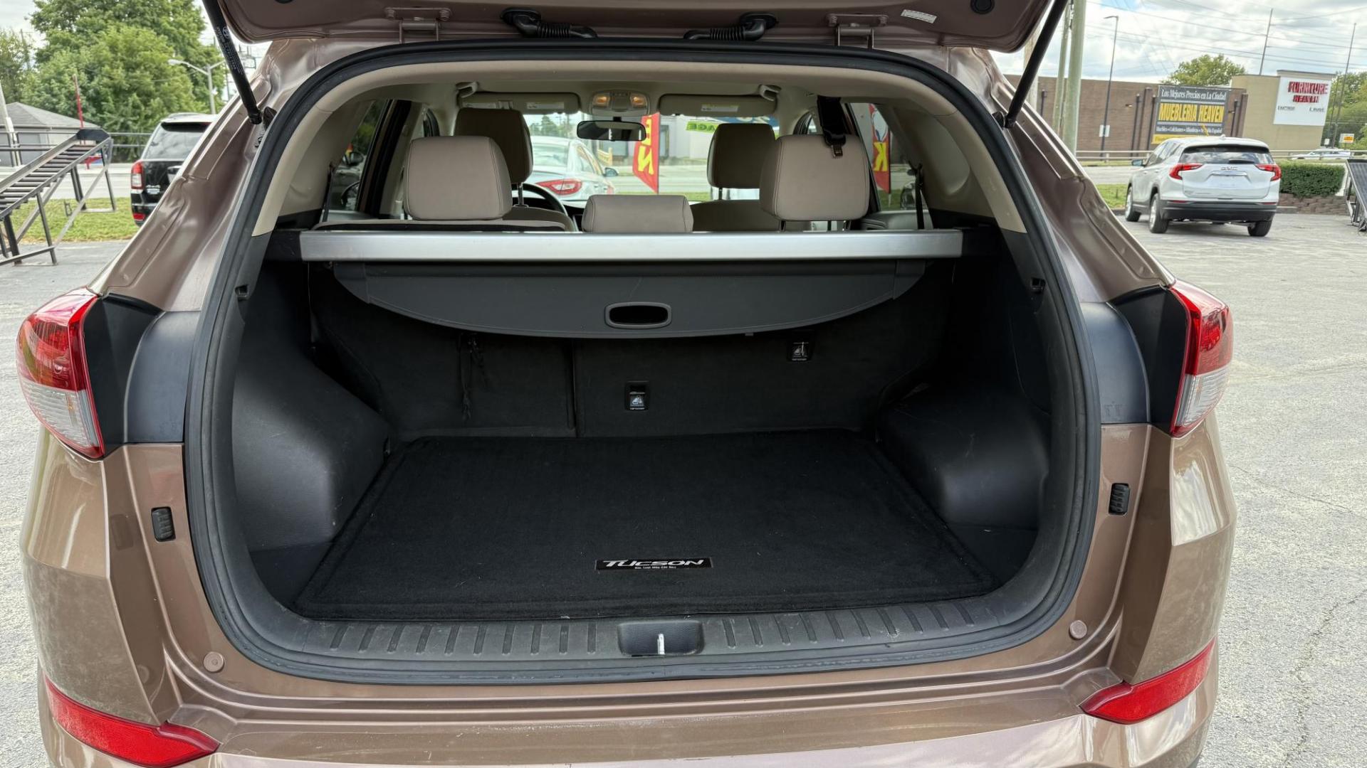 2017 BROWN /TAN Hyundai Tucson Eco AWD (KM8J3CA29HU) with an 1.6L L4 DOHC 16V engine, 7A transmission, located at 2710A Westlane Rd., Indianapolis, IN, 46268, (317) 291-2000, 39.885670, -86.208160 - Photo#6