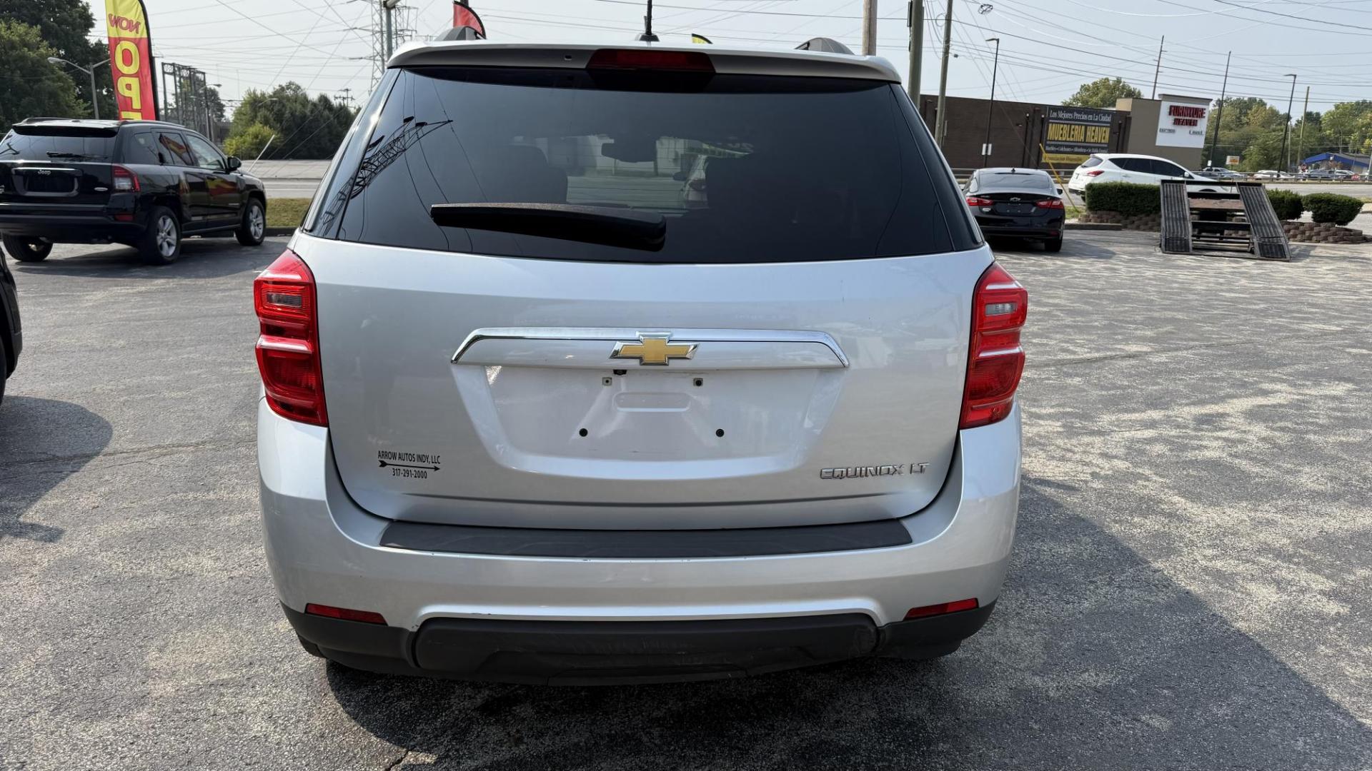 2016 SILVER /GRAY Chevrolet Equinox LT 2WD (2GNALCEK5G1) with an 2.4L L4 DOHC 16V FFV engine, 6A transmission, located at 2710A Westlane Rd., Indianapolis, IN, 46268, (317) 291-2000, 39.885670, -86.208160 - Photo#5