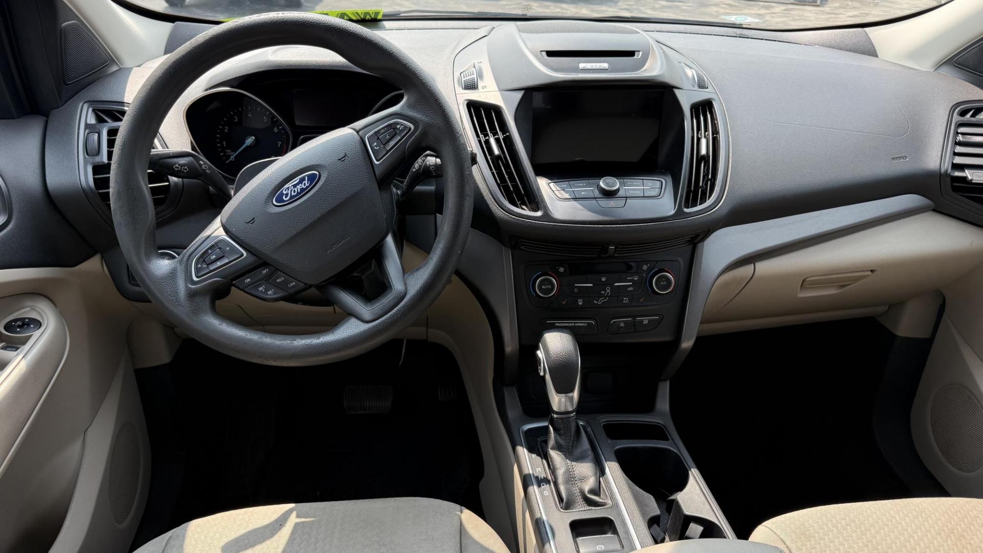 2018 BLACK /TAN Ford Escape SE FWD (1FMCU0GD8JU) with an 1.5L L4 DOHC 16V engine, 6A transmission, located at 2710A Westlane Rd., Indianapolis, IN, 46268, (317) 291-2000, 39.885670, -86.208160 - Photo#5