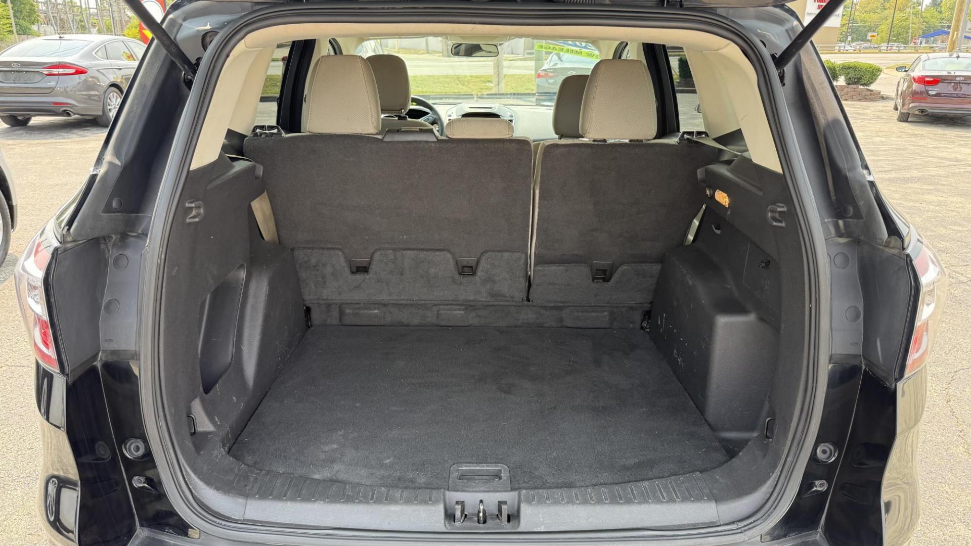 2018 BLACK /TAN Ford Escape SE FWD (1FMCU0GD8JU) with an 1.5L L4 DOHC 16V engine, 6A transmission, located at 2710A Westlane Rd., Indianapolis, IN, 46268, (317) 291-2000, 39.885670, -86.208160 - Photo#6