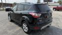 2018 BLACK /TAN Ford Escape SE FWD (1FMCU0GD8JU) with an 1.5L L4 DOHC 16V engine, 6A transmission, located at 2710A Westlane Rd., Indianapolis, IN, 46268, (317) 291-2000, 39.885670, -86.208160 - Photo#7
